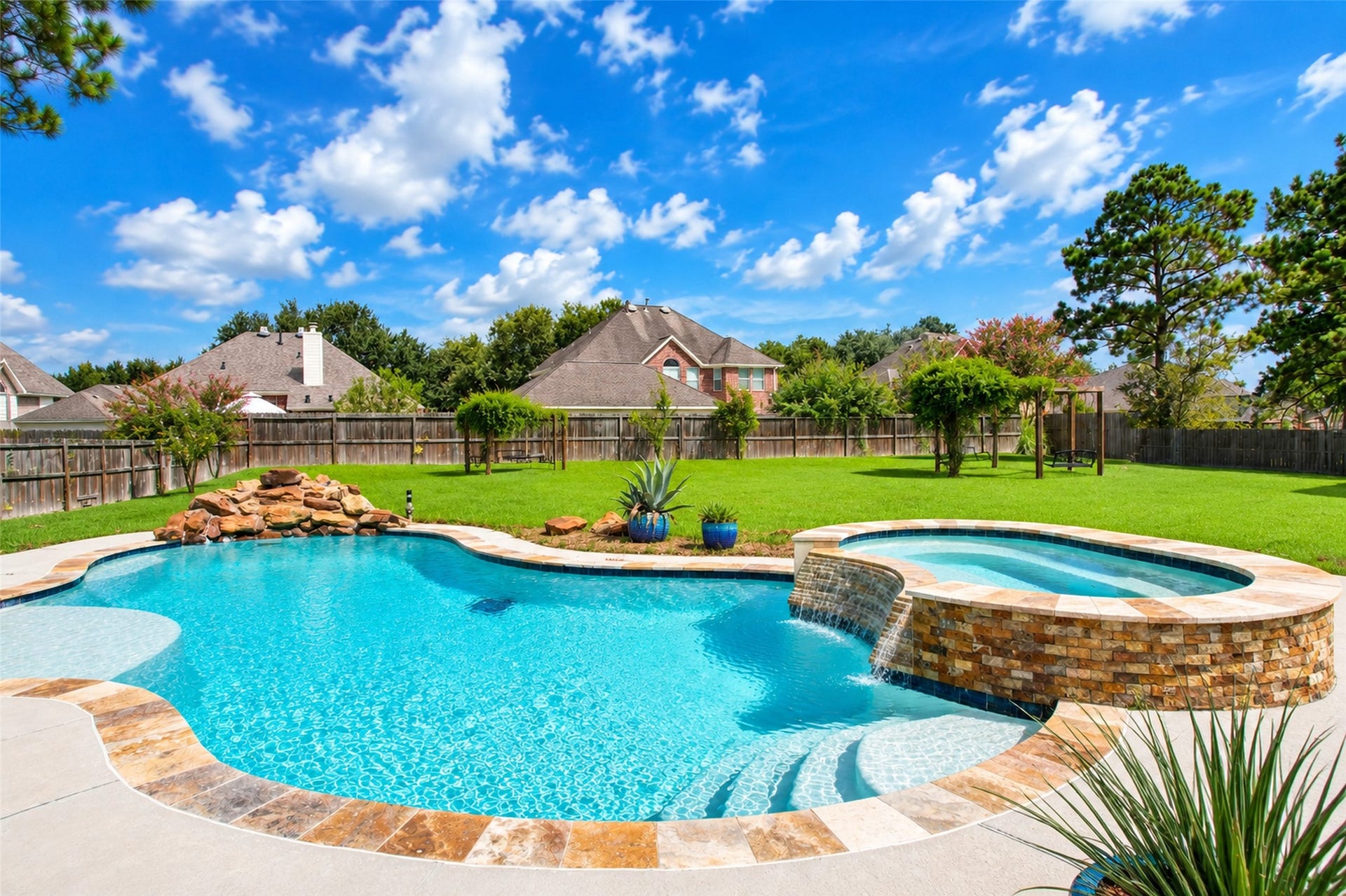 436 Old Orchard Court, Dickinson, TX 77539 Pool and spa with the full depth of the yard behind