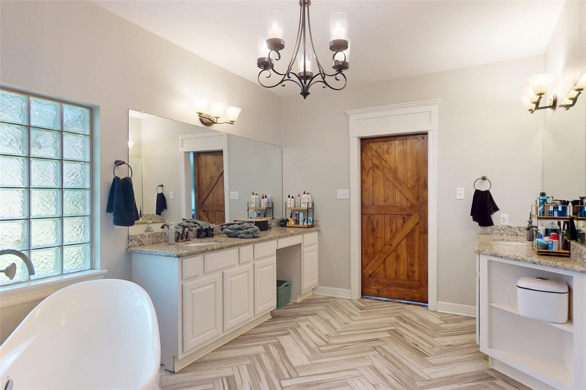 436 Old Orchard Court, Dickinson, TX 77539 Primary bath double vanity with seated station and barn door