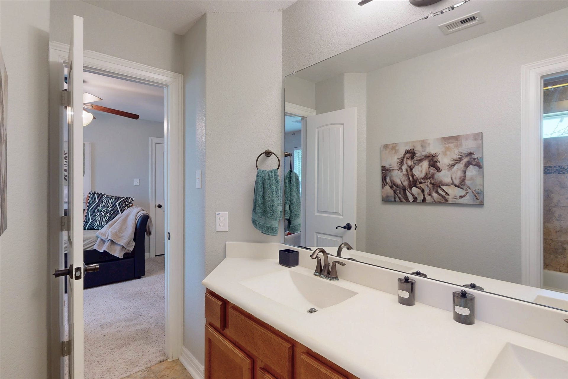 436 Old Orchard Court, Dickinson, TX 77539 Secondary bath double vanity opening to a bedroom