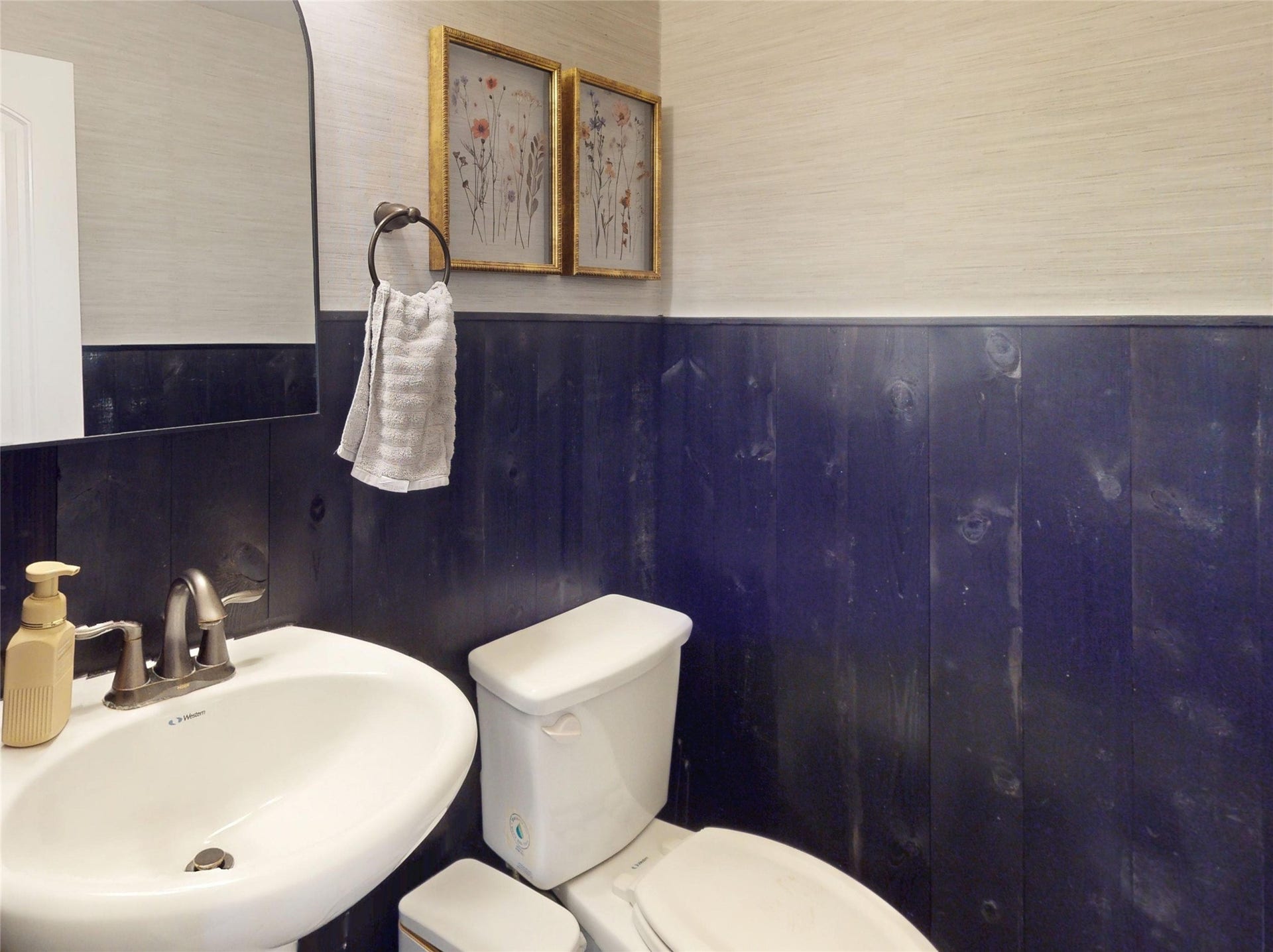 436 Old Orchard Court, Dickinson, TX 77539 Secondary bath with navy board-and-batten