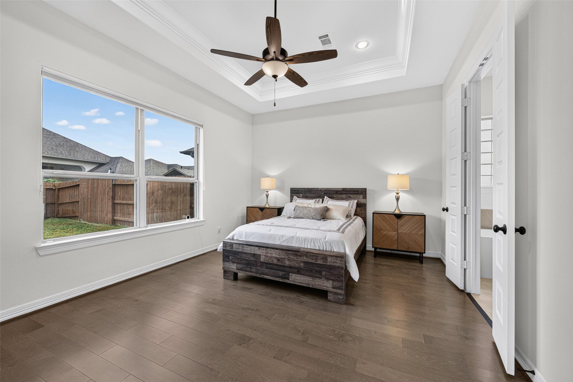 10706 Hazel Hills Drive, Cypress, TX 77433 Your private retreat awaits in the spacious primary bedroom, designed with serene comfort in mind.