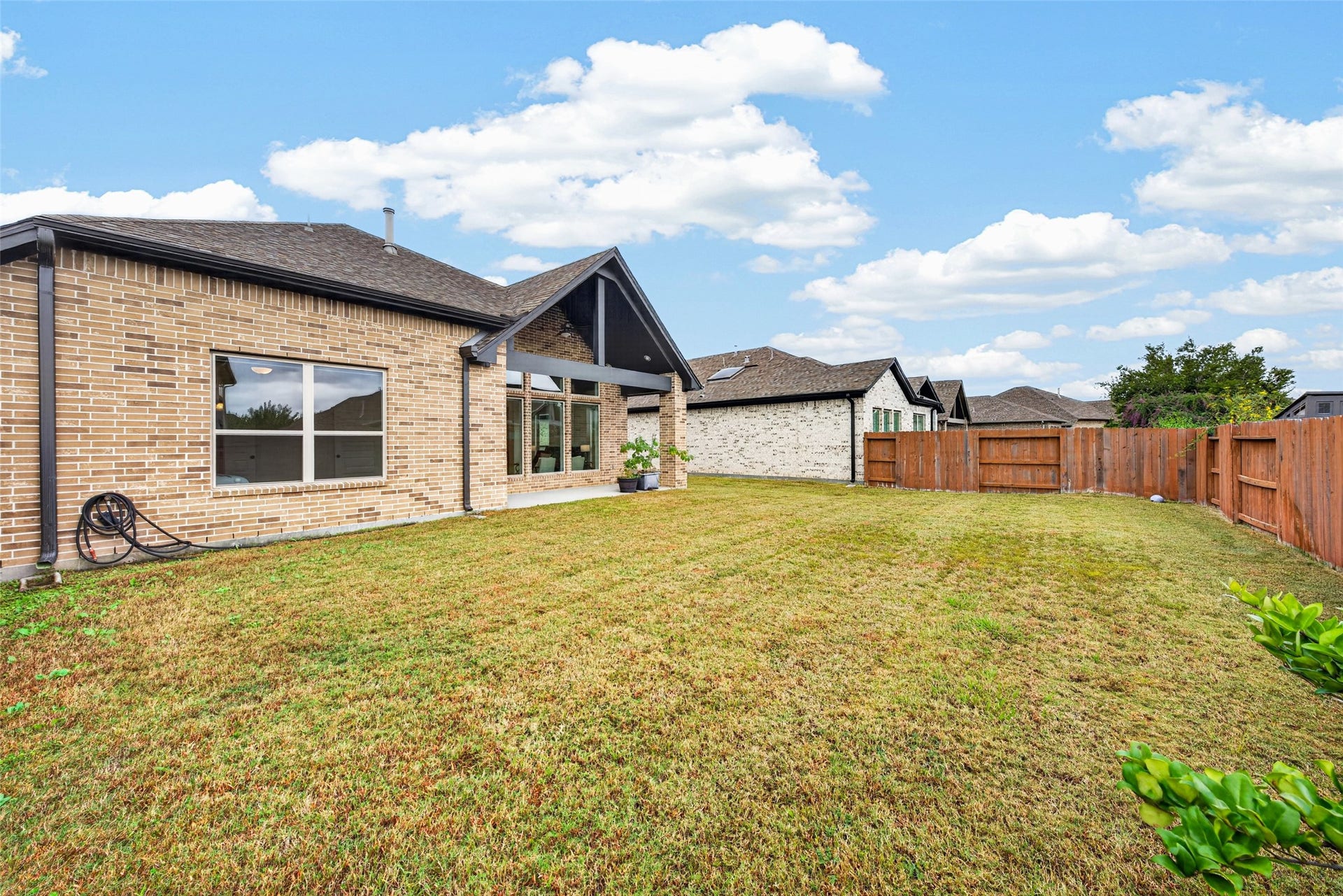 10706 Hazel Hills Drive, Cypress, TX 77433 Its a warm, welcoming outdoor hub designed for lifes best celebrations and quiet, peaceful moments alike.