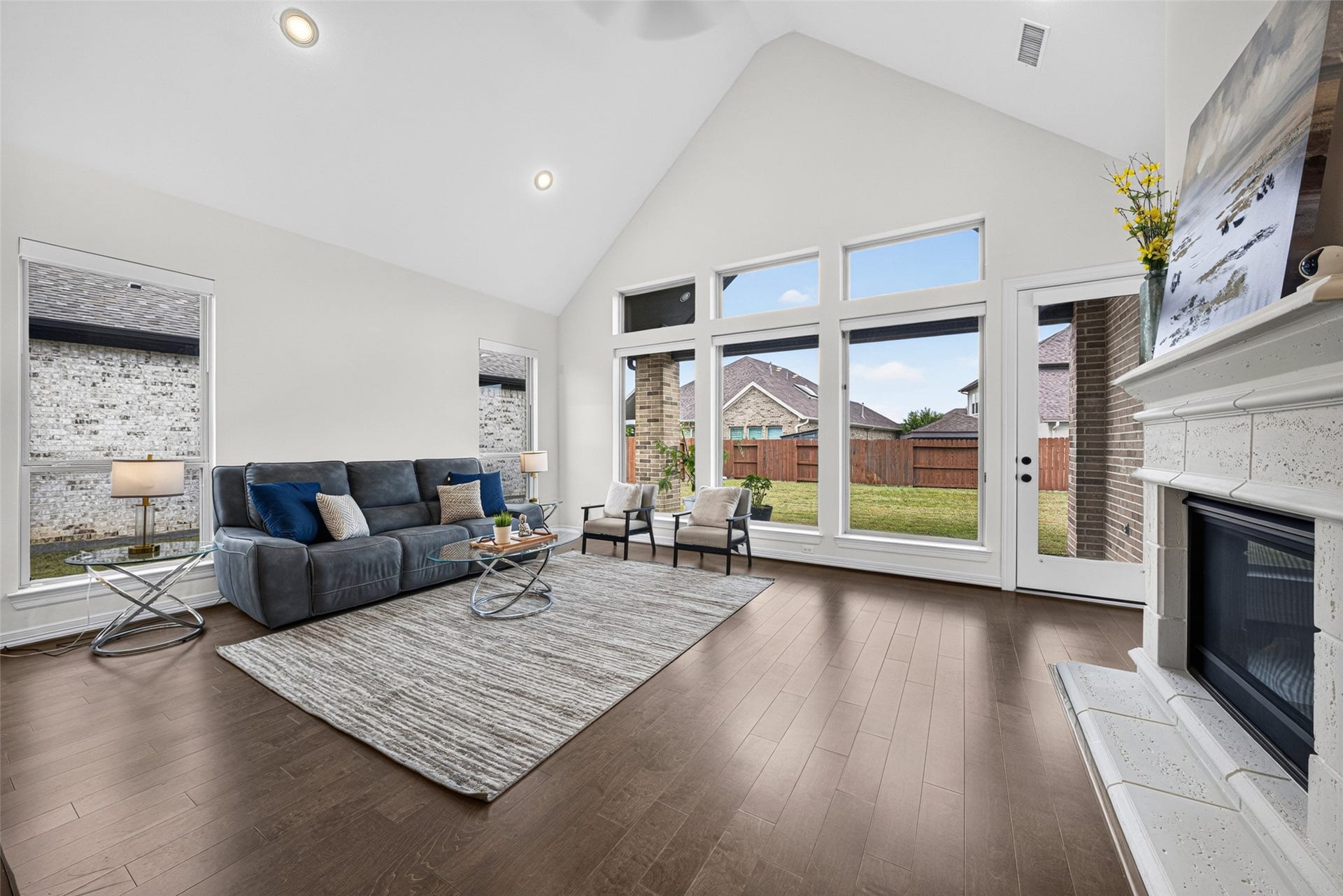 10706 Hazel Hills Drive, Cypress, TX 77433 Centered around a cozy fireplace, this welcoming space offers picturesque views of the tranquil backyard, making it the ultimate spot to unwind after a long day.