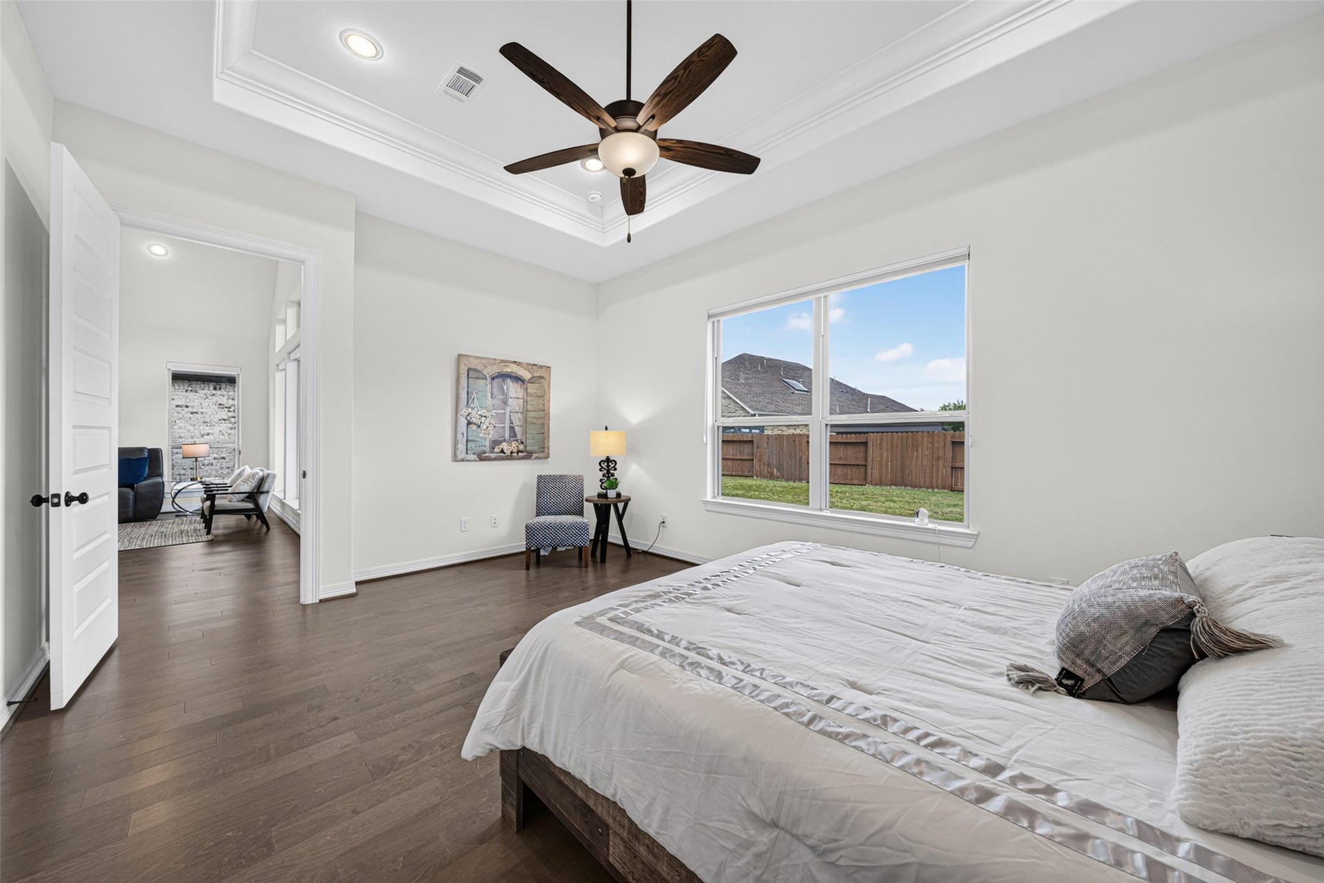 10706 Hazel Hills Drive, Cypress, TX 77433 Wide window frames delightful views of the lush backyard, filling the room with soothing natural light each morning.