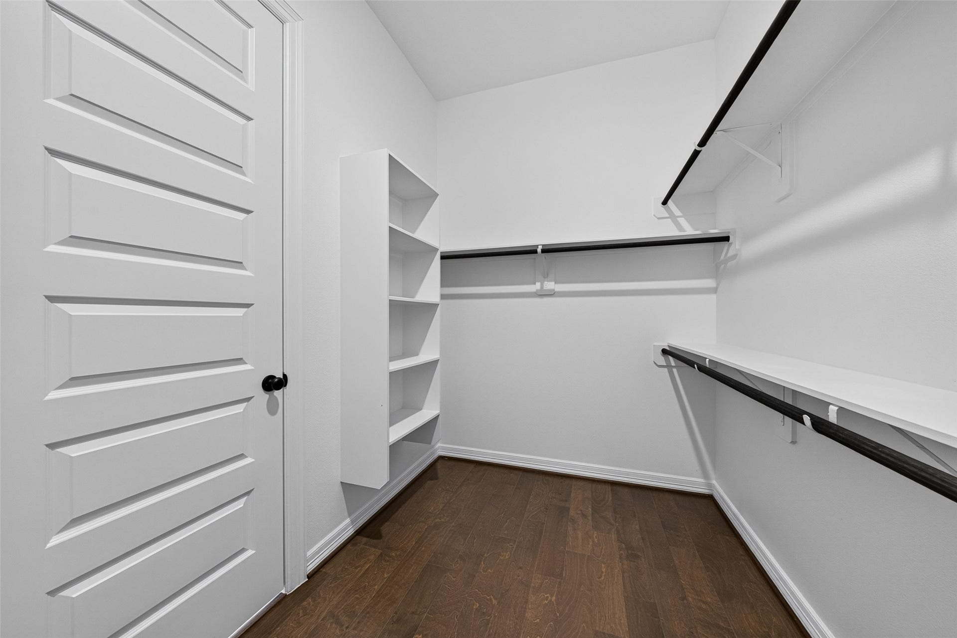 10706 Hazel Hills Drive, Cypress, TX 77433 Thoughtfully arranged with tailored compartments and versatile storage, this closet effortlessly accommodates shoes, accessories, and seasonal wear.