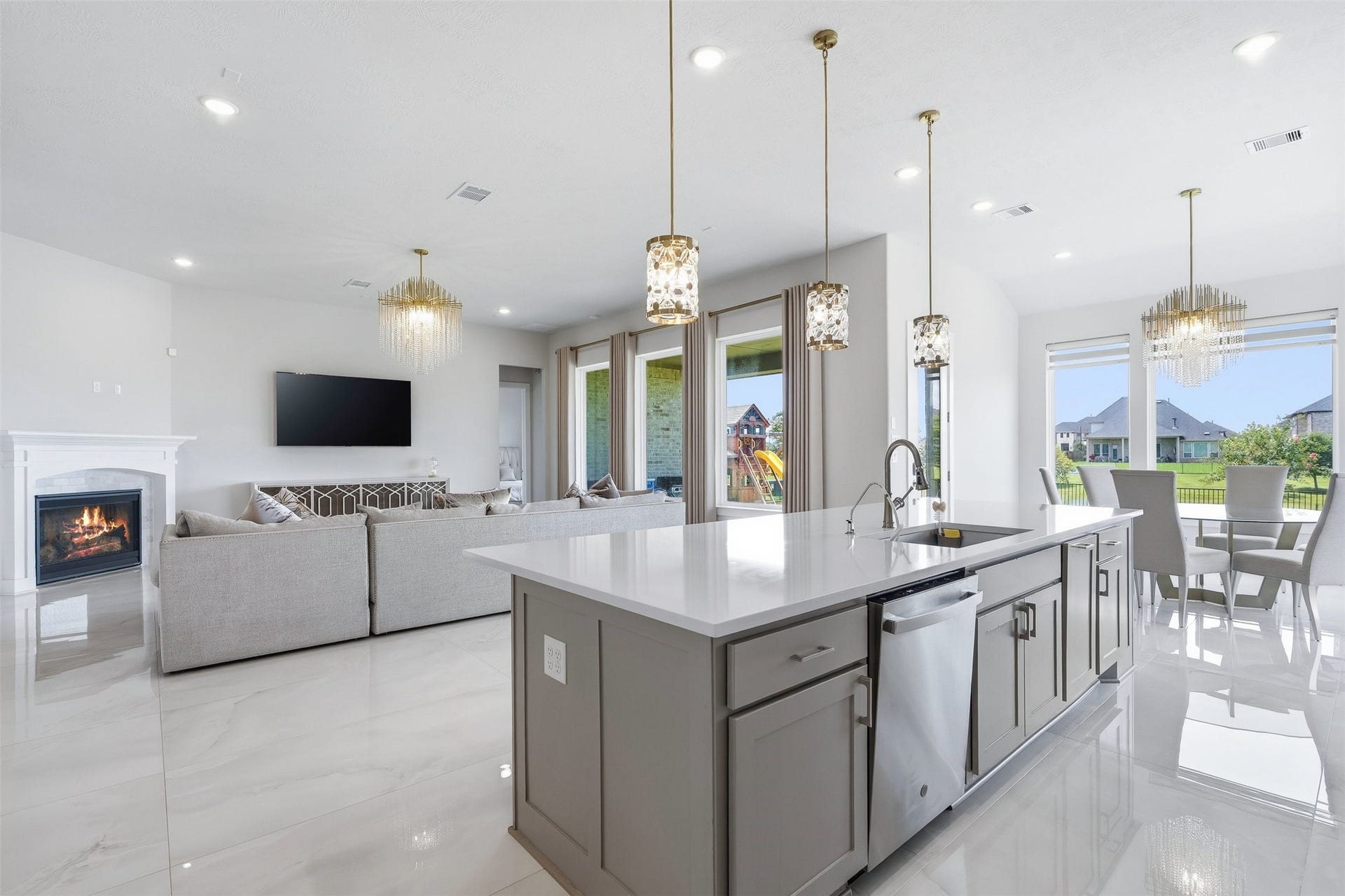This open floor plan creates a seamless flow between living spaces, making entertaining effortless and enjoyable!