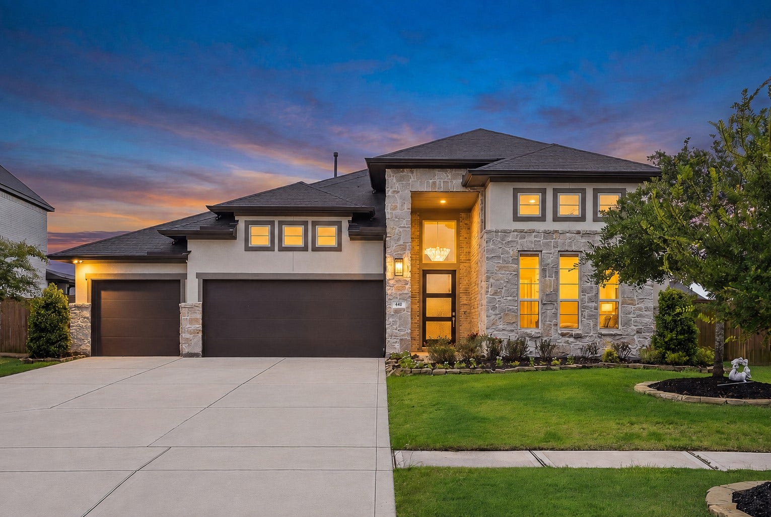 This stunning Tri Pointe home makes a statement from the moment you arrive. From the beautiful stone/stucco exterior and architectural details to the warm twilight glow, this is the kind of curb appeal that feels like home before you even step inside.