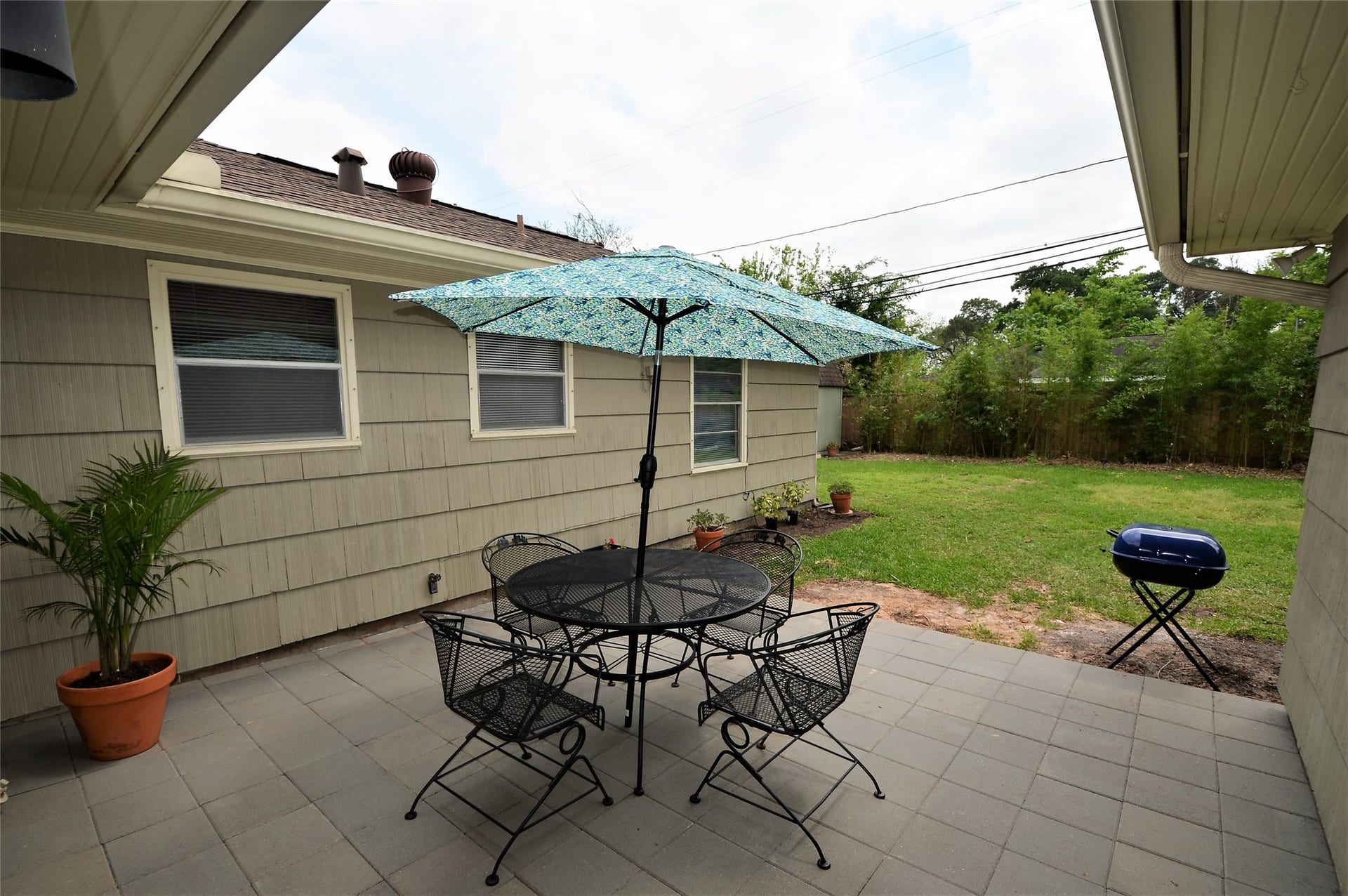 Spacious paved patio perfect for relaxing afternoons.