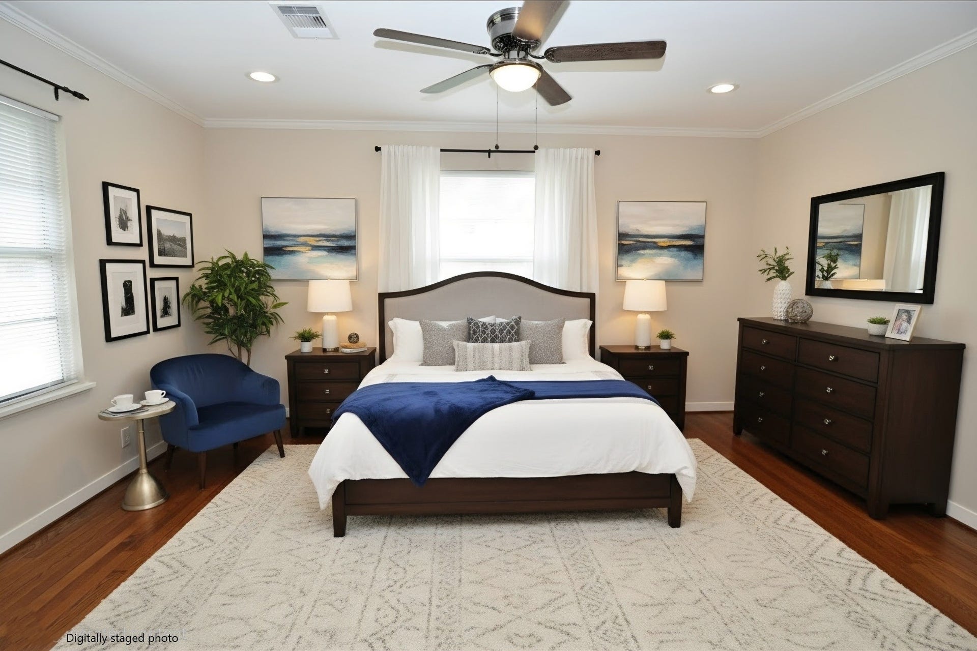 Big master bedroom with dimmable recessed lighting, ceiling fan, and stunning backyard views.