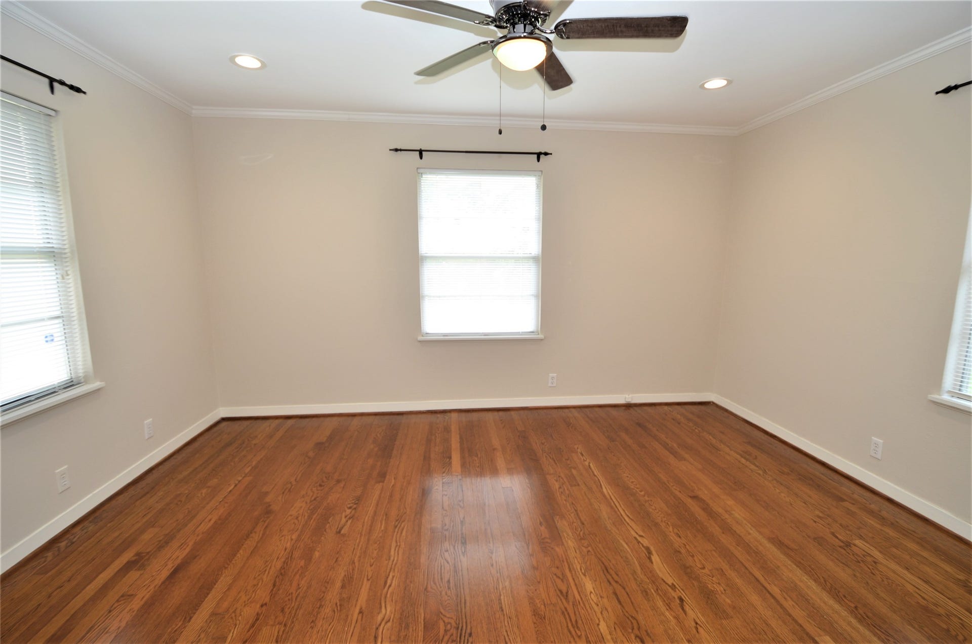 Spacious master bedroom with lot of natural light.