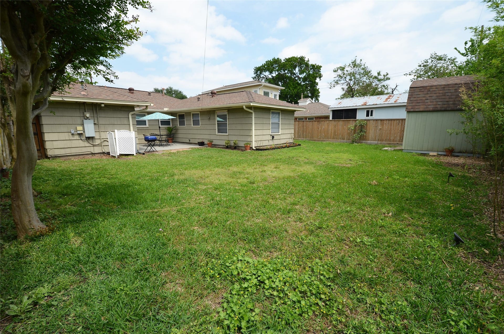 Spacious backyard, perfect for gatherings.
