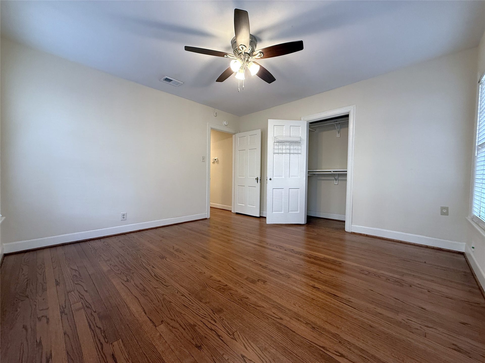 1968 Dryden Road, #2, Houston, TX 77030 Alternate view of the back bedroom. The closet offers double hang bars.