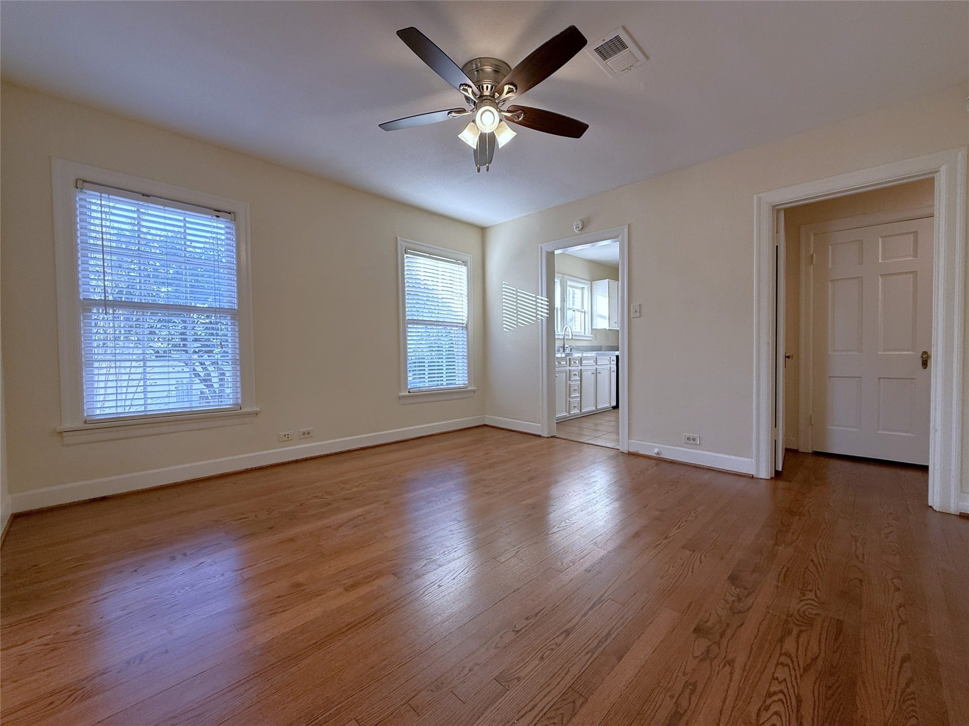 1968 Dryden Road, #2, Houston, TX 77030 from the dining room, a privacy door opens into the hallway leading to the bedrooms & baths.