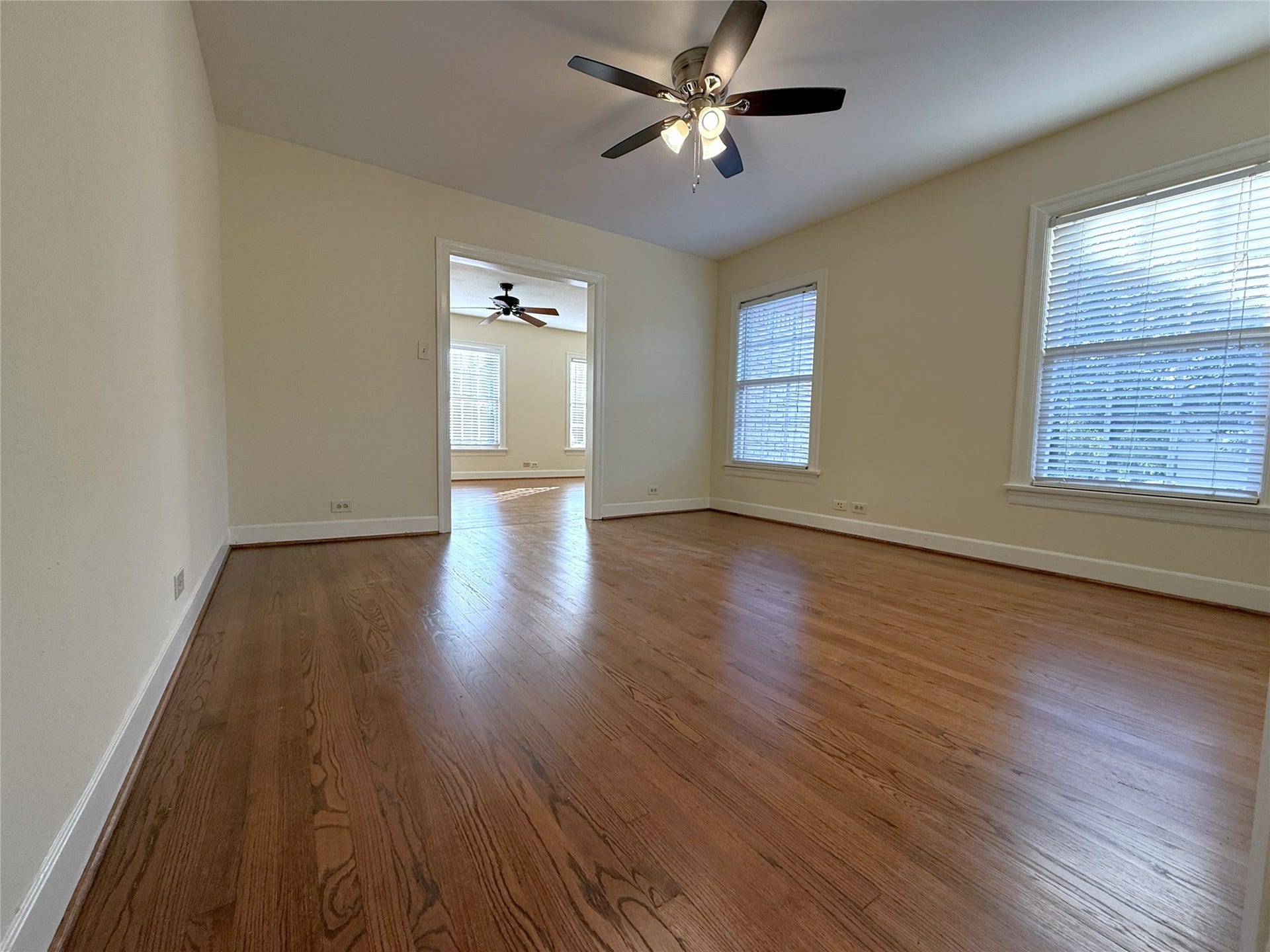 1968 Dryden Road, #2, Houston, TX 77030 In the dining room, with ceiling fan, natural light flows in from twin windows.