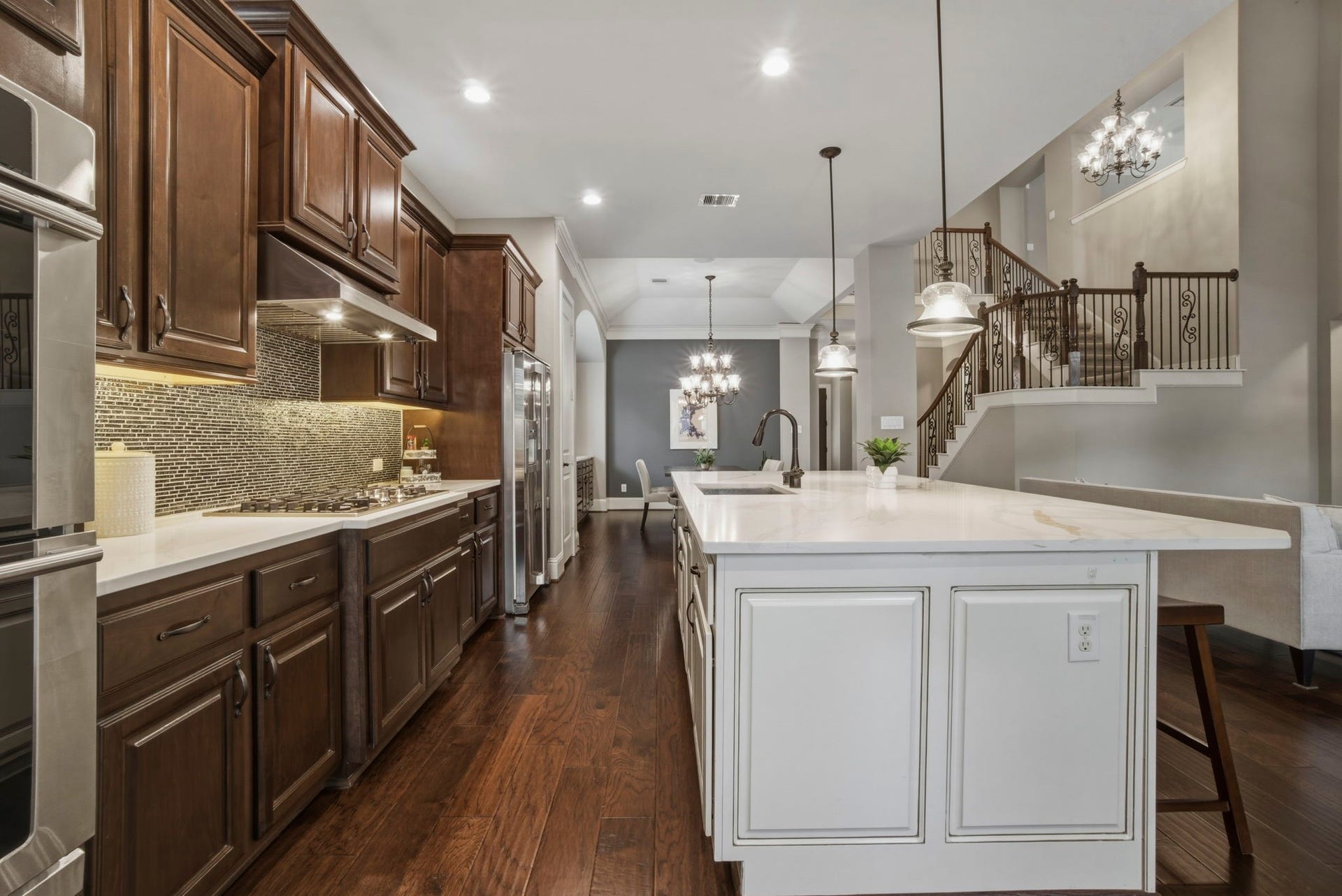 75 W Sawyer Ridge Drive, The Woodlands, TX 77389 A view from the kitchen to the dining room.
