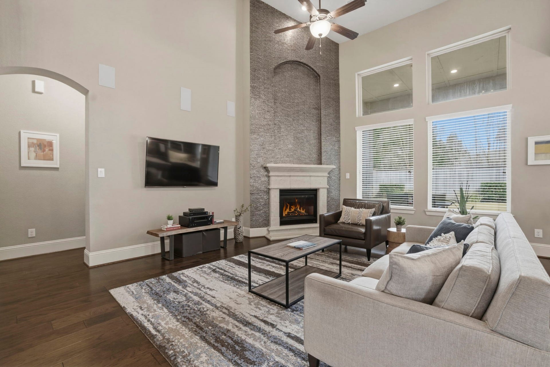 75 W Sawyer Ridge Drive, The Woodlands, TX 77389 Cozy up next to the fireplace.