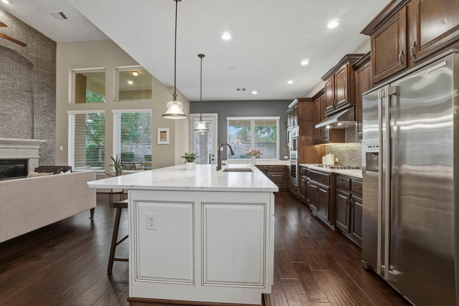 75 W Sawyer Ridge Drive, The Woodlands, TX 77389 Chef's kitchen looks out to the backyard. No rear neighbors!