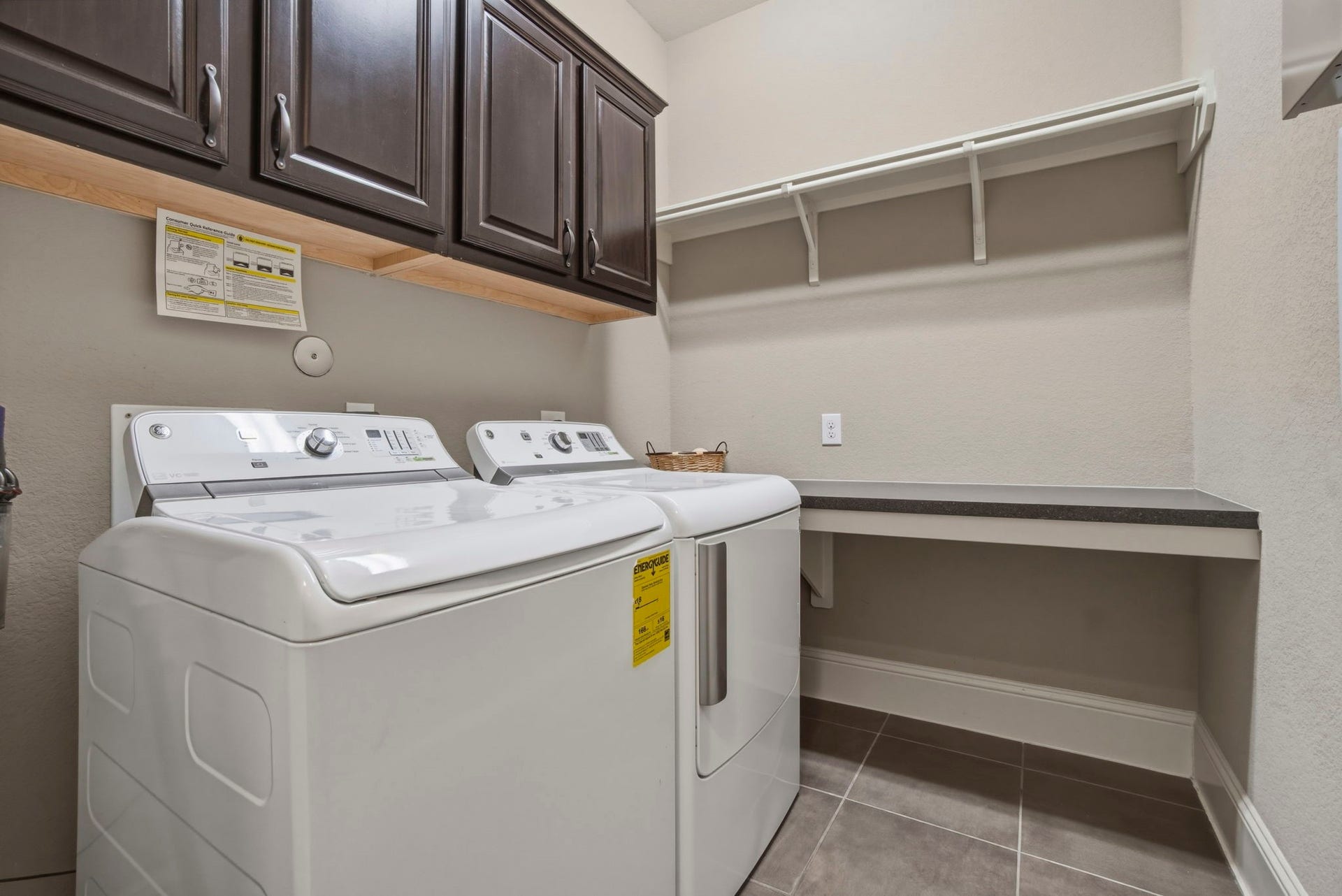 75 W Sawyer Ridge Drive, The Woodlands, TX 77389 First floor laundry room with great storage.
