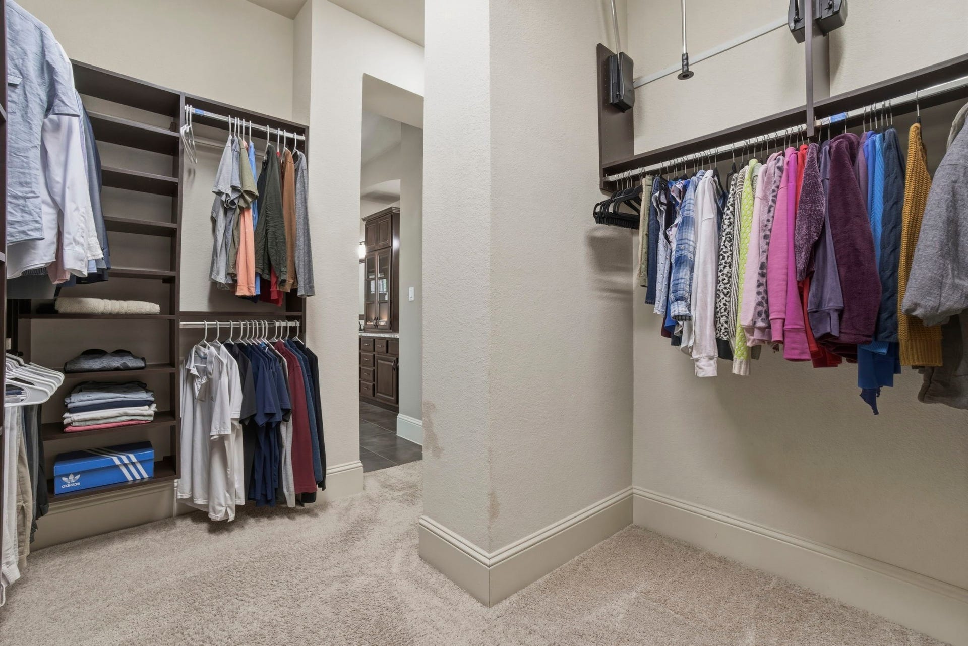 75 W Sawyer Ridge Drive, The Woodlands, TX 77389 Primary walk in closet with ample space.