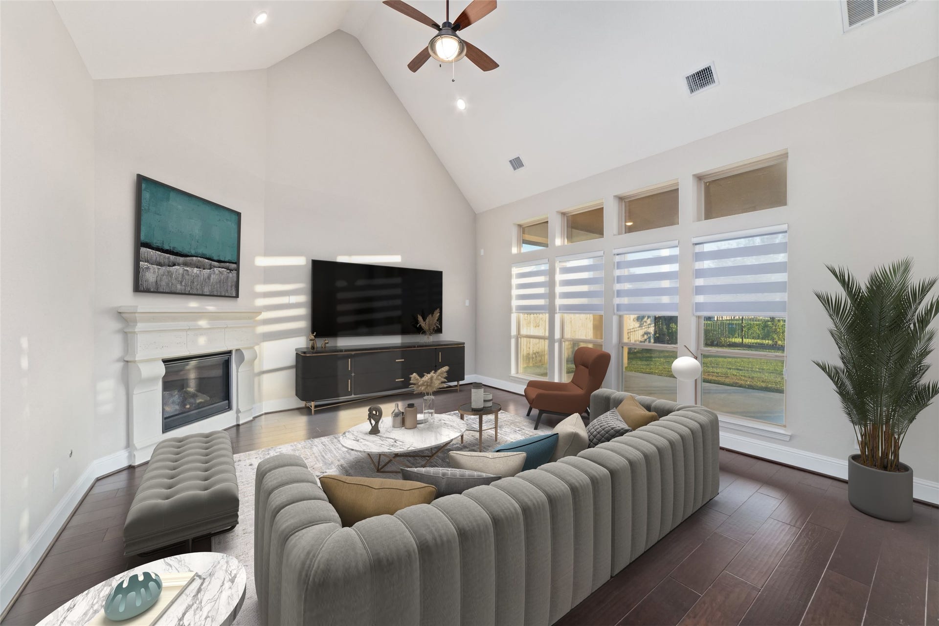 virtual staged family room with high ceiling, cozy fireplace