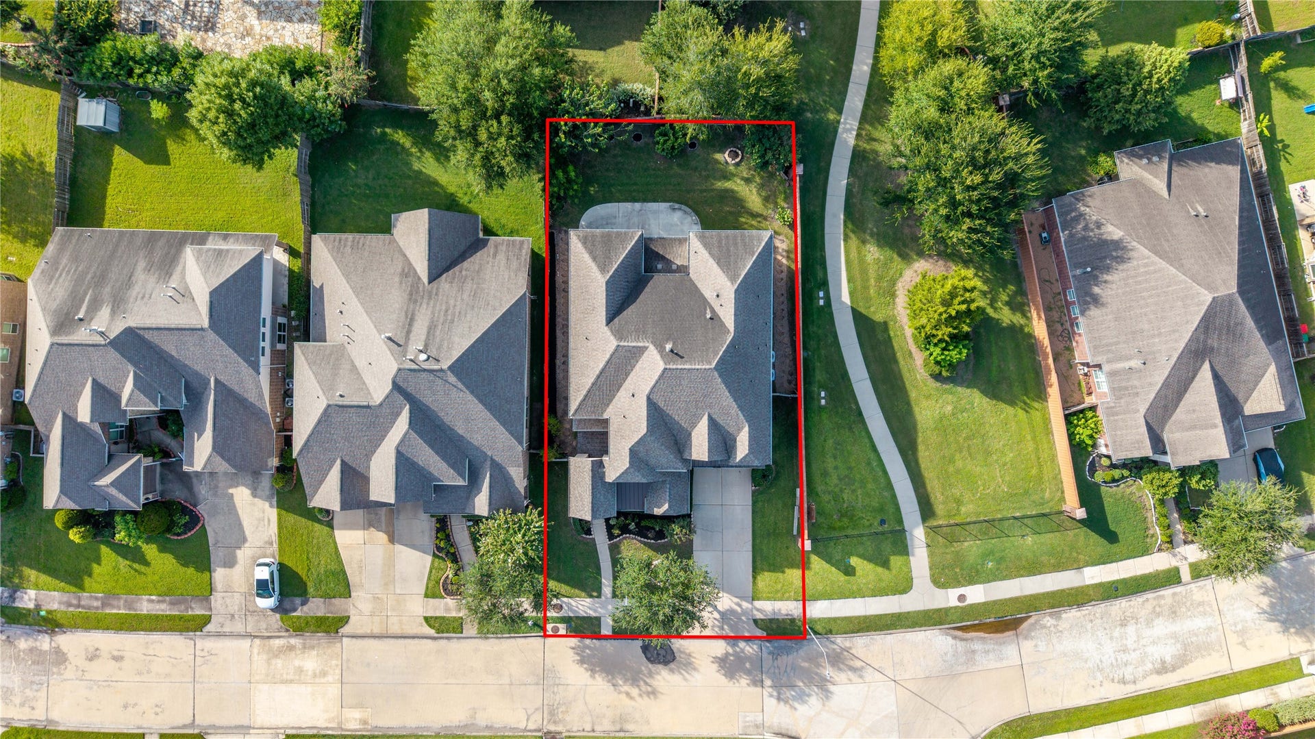 17302 Milrig Court, Richmond, TX 77407 Inviting home in a friendly neighborhood, featuring a spacious backyard and a convenient pathway for leisurely strolls.