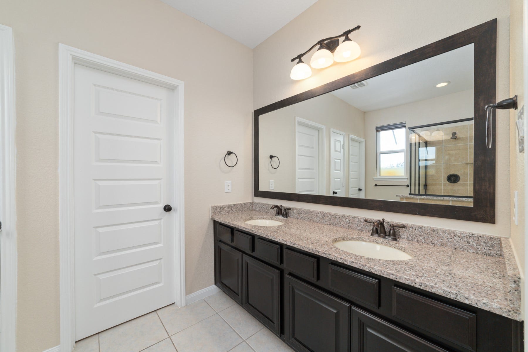 17302 Milrig Court, Richmond, TX 77407 Bedroom #5 - Discover the luxurious third primary bedroom featuring an elegant stand-up shower, perfect for ultimate comfort and convenience.