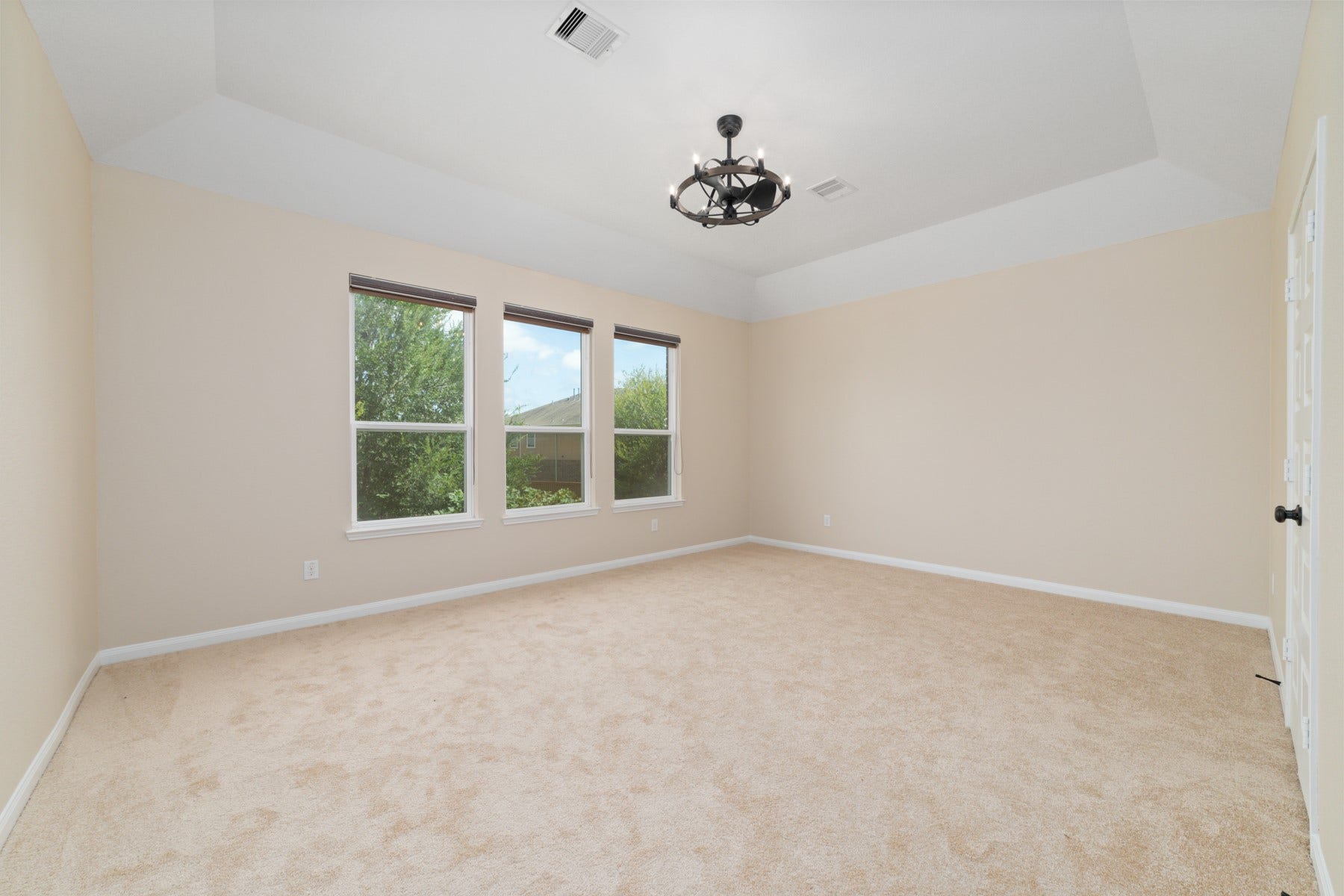 17302 Milrig Court, Richmond, TX 77407 Bedroom #6 - Discover the third luxurious primary bedroom upstairs, complete with its own ensuite bathroom, offering comfort and privacy.