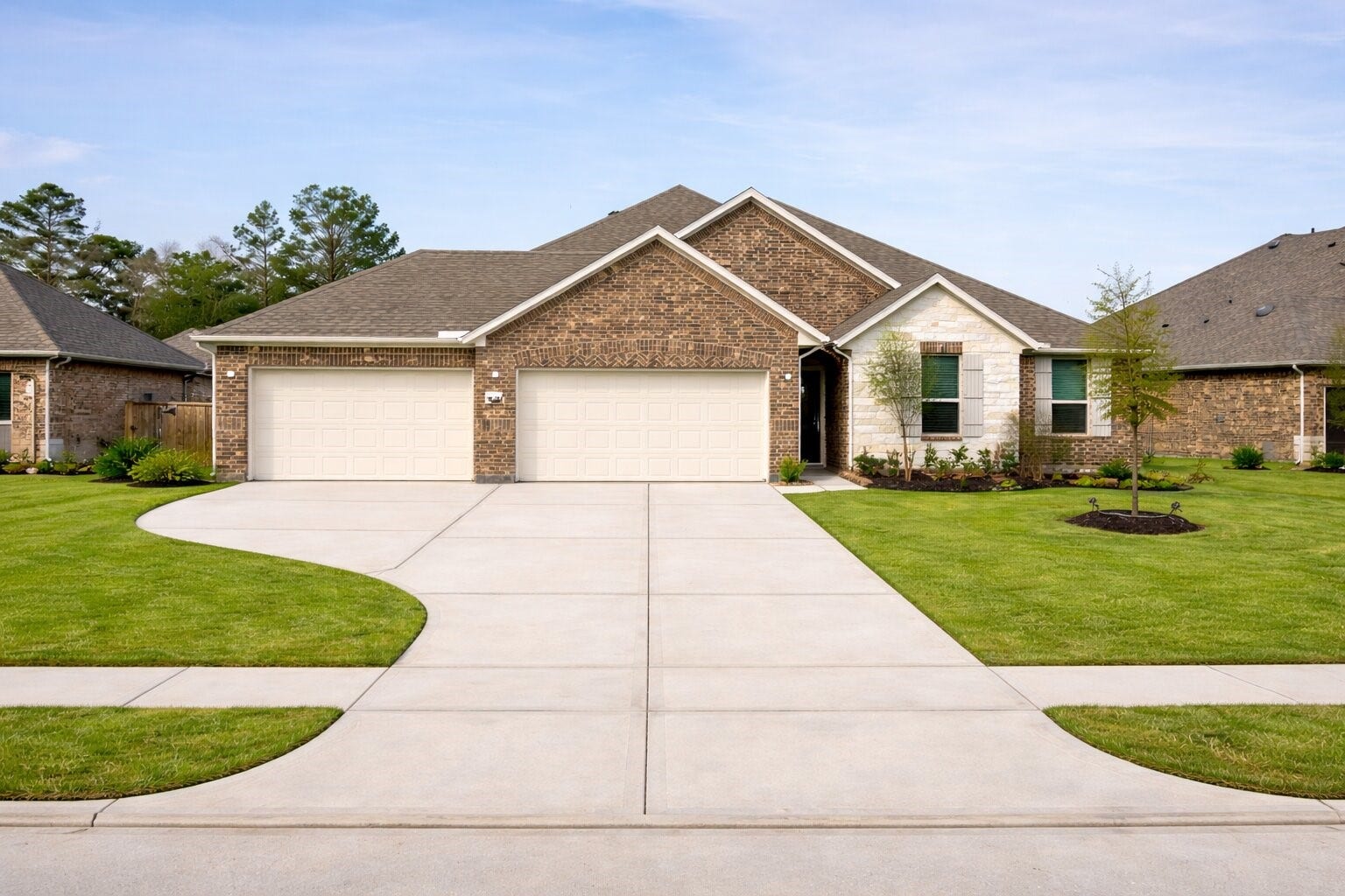 This charming home boasts a modern brick design with a spacious three-car garage and a beautifully maintained front yard, featuring lush green grass and young trees that enhance its excellent curb appeal.