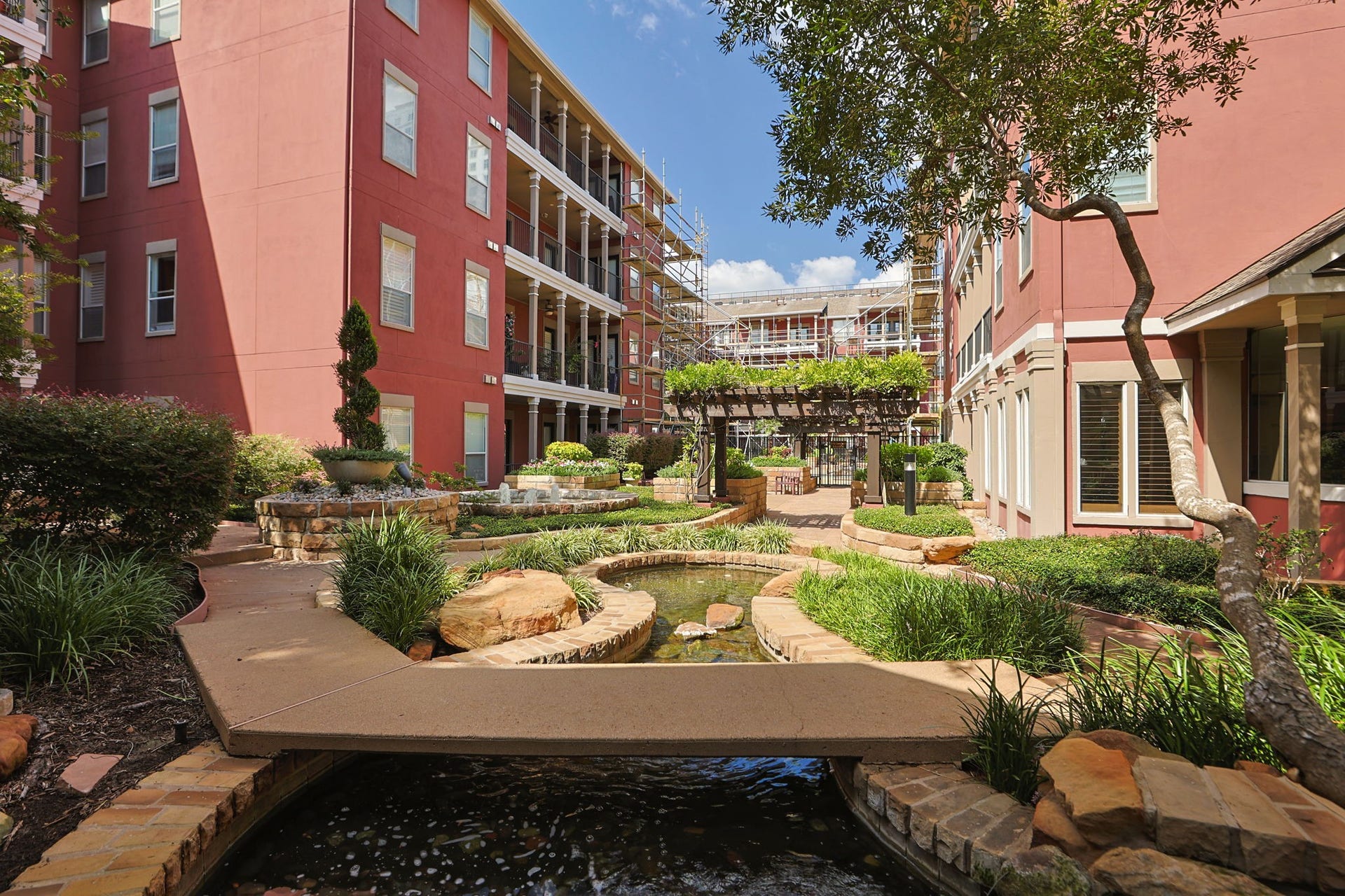 2400 S Mccue Road, #104, Houston, TX 77056 View of court yard leading into pool area.