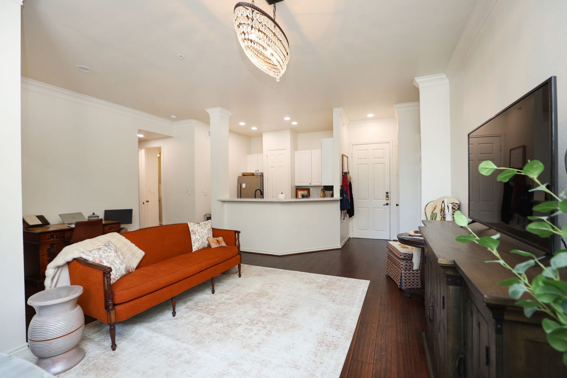 2400 S Mccue Road, #104, Houston, TX 77056 From living room looking into kitchen and facing the bathroom/bedroomto left.