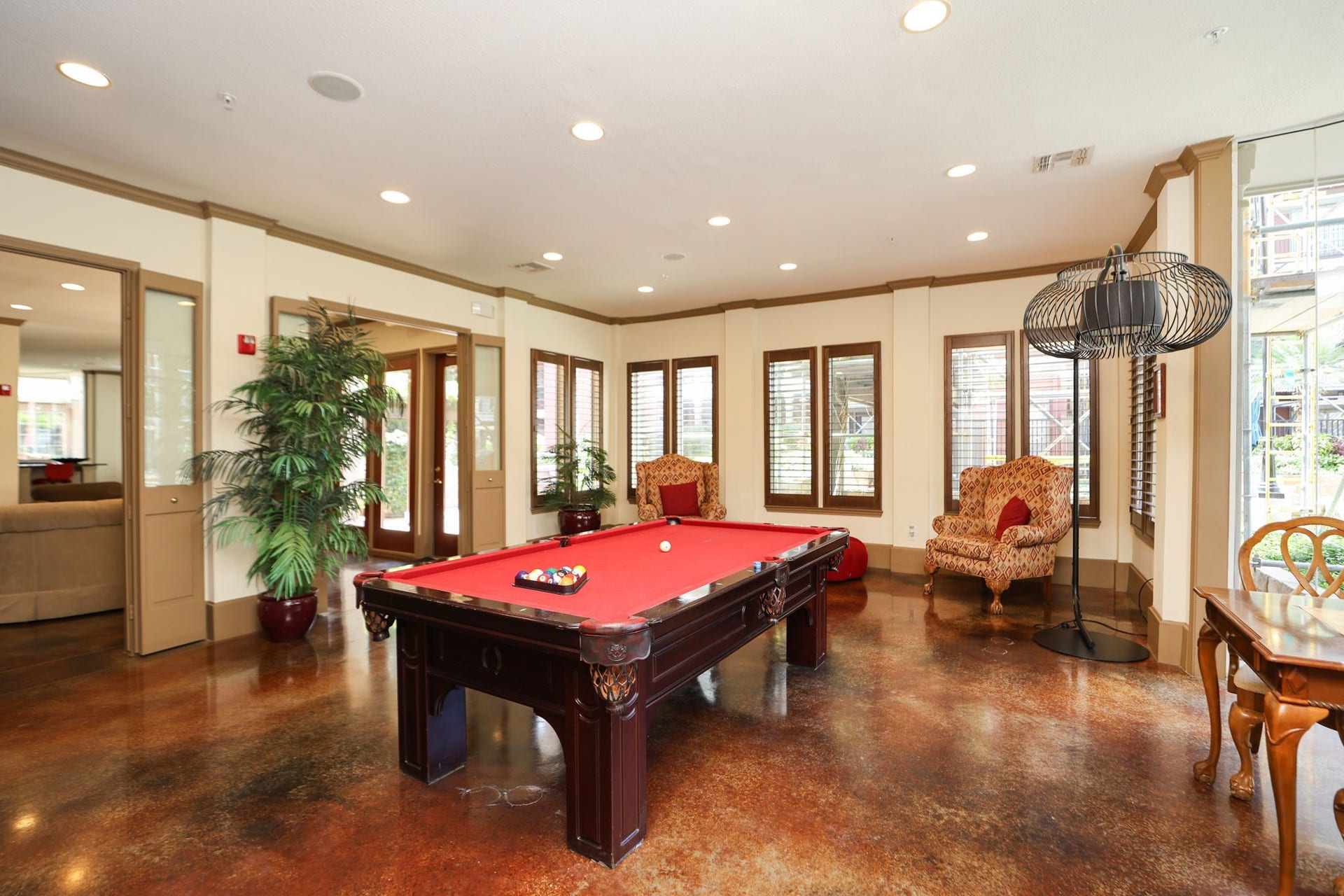 2400 S Mccue Road, #104, Houston, TX 77056 Club house looking out to pool area.