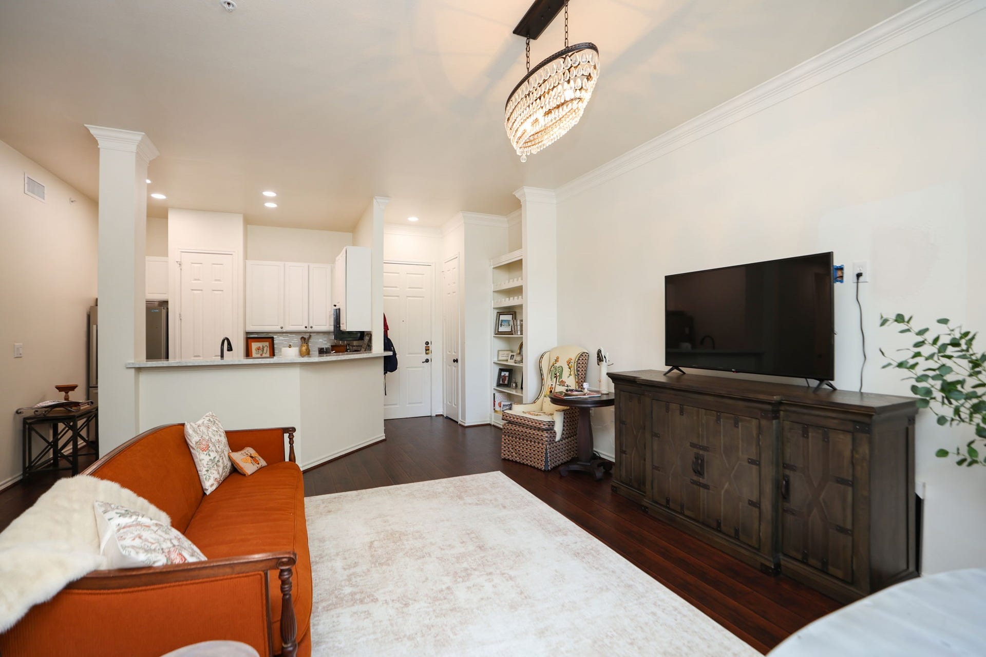 2400 S Mccue Road, #104, Houston, TX 77056 View from living room looking into kitchen with breakfast bar.