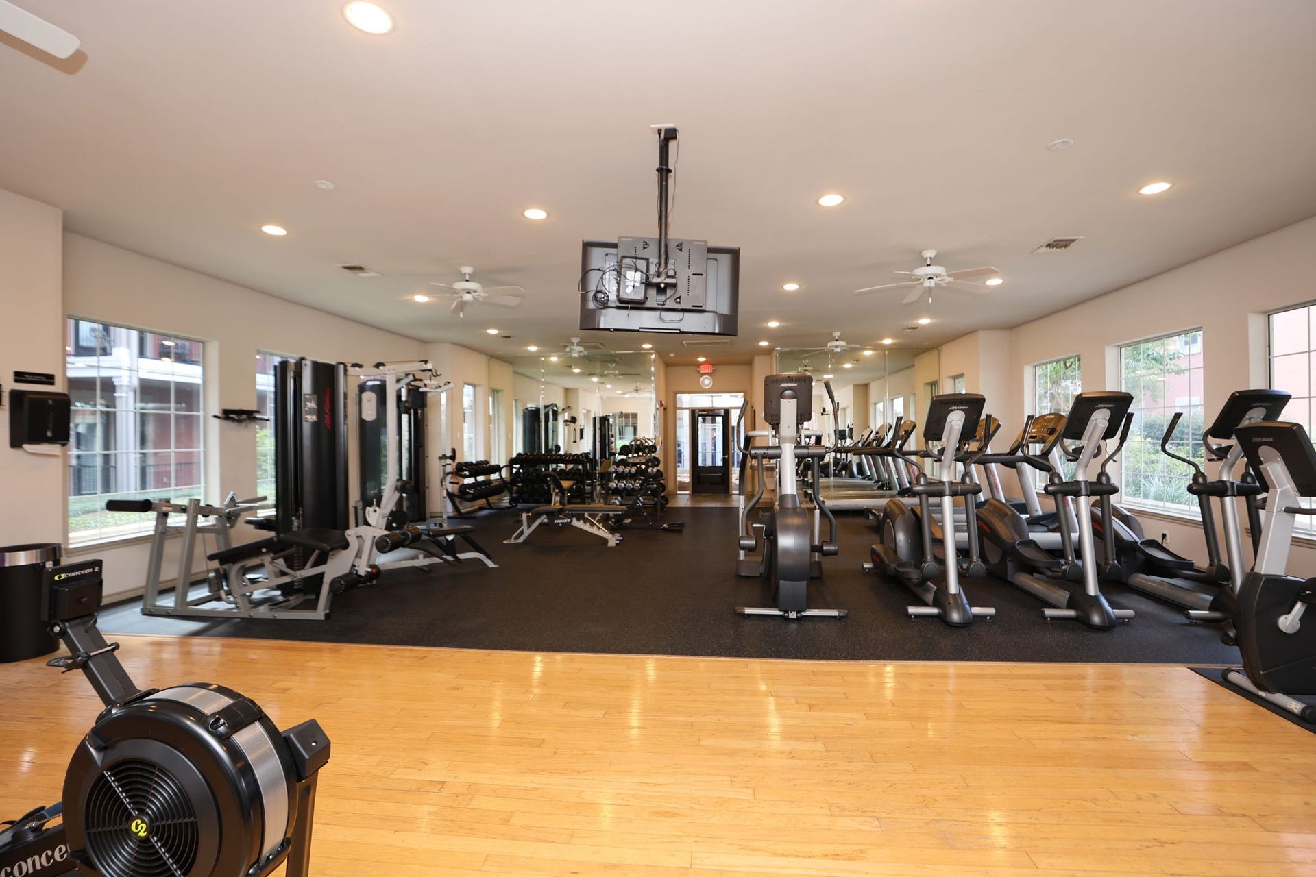 2400 S Mccue Road, #104, Houston, TX 77056 2nd view of large fitness center with views of courtyards and pool.