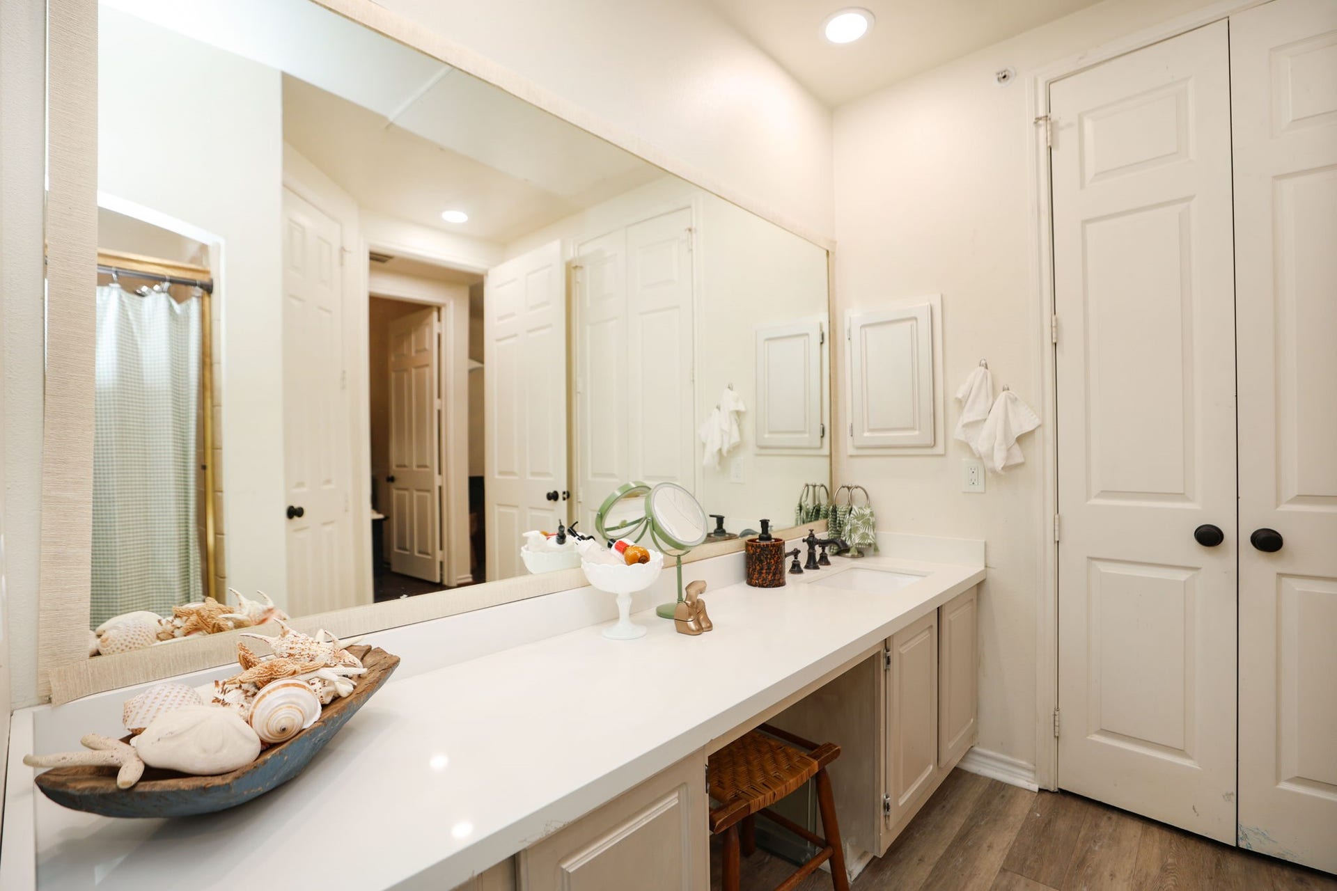 2400 S Mccue Road, #104, Houston, TX 77056 View from shower area looking into bathroom and W/D to right ot counter top.