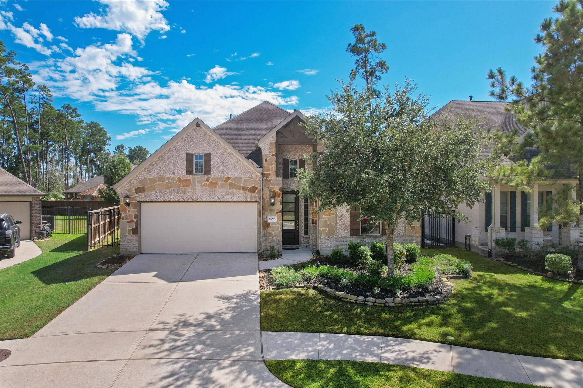 28205 Bennett Pass Drive, Spring, TX 77386 Double wide driveway and concrete sidewalks