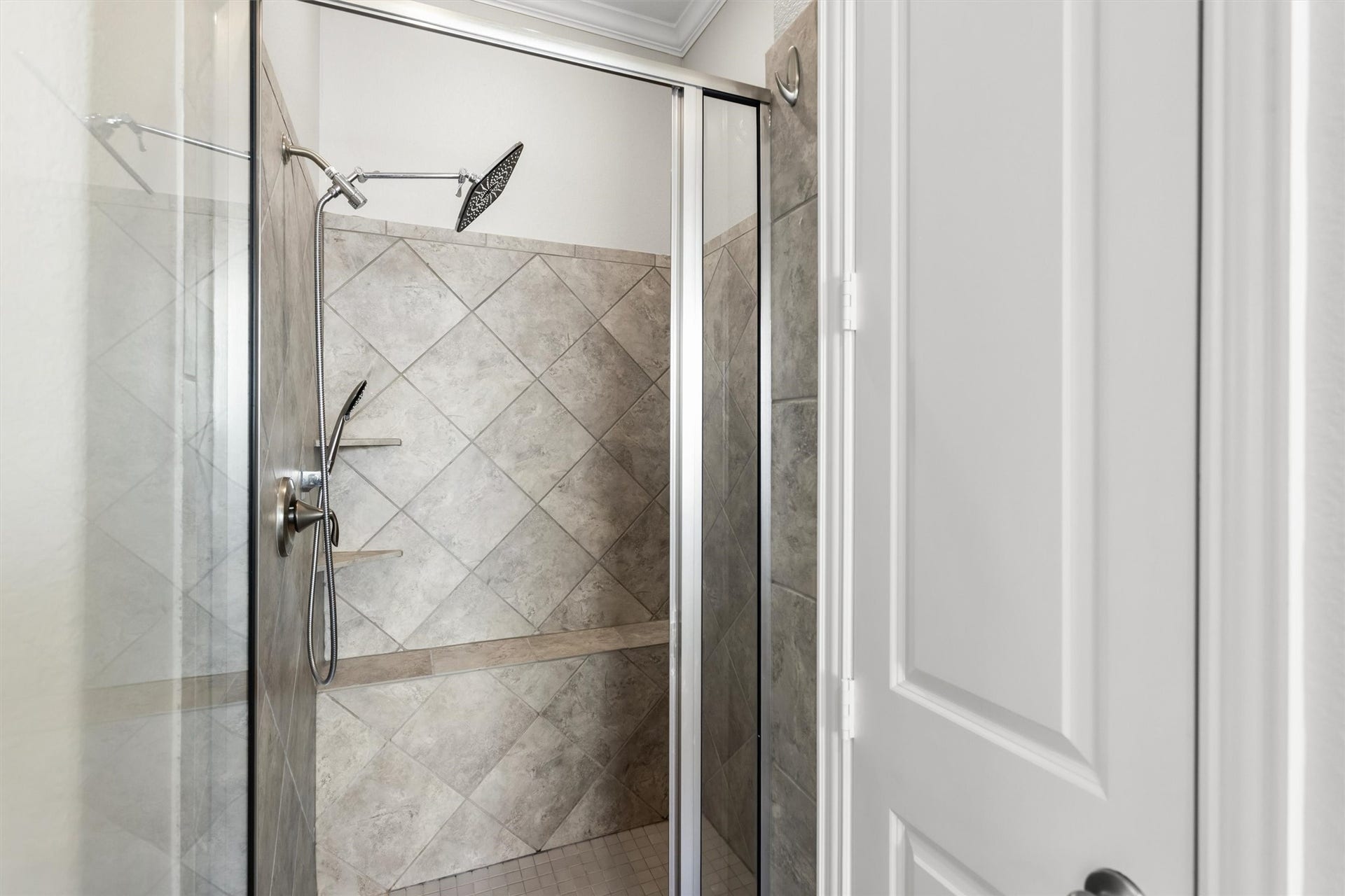 28205 Bennett Pass Drive, Spring, TX 77386 Shower with seat and large rain head