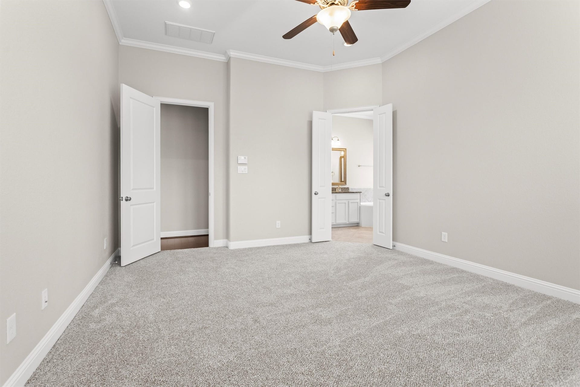 28205 Bennett Pass Drive, Spring, TX 77386 Double door entry to the primary bathroom