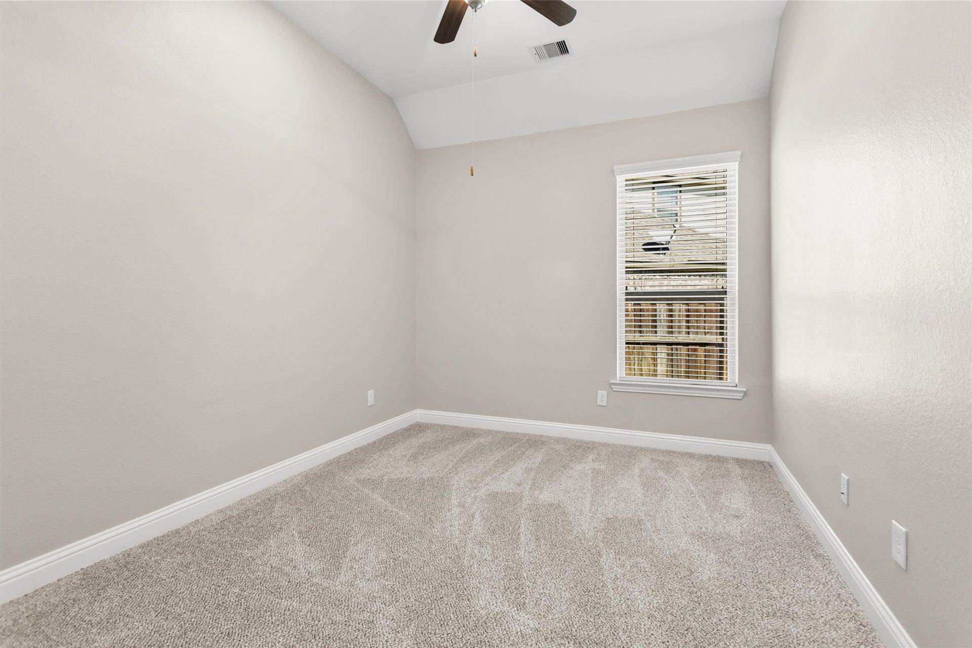 28205 Bennett Pass Drive, Spring, TX 77386 3rd bedroom. The bedrooms are the only carpeted spaces in the home