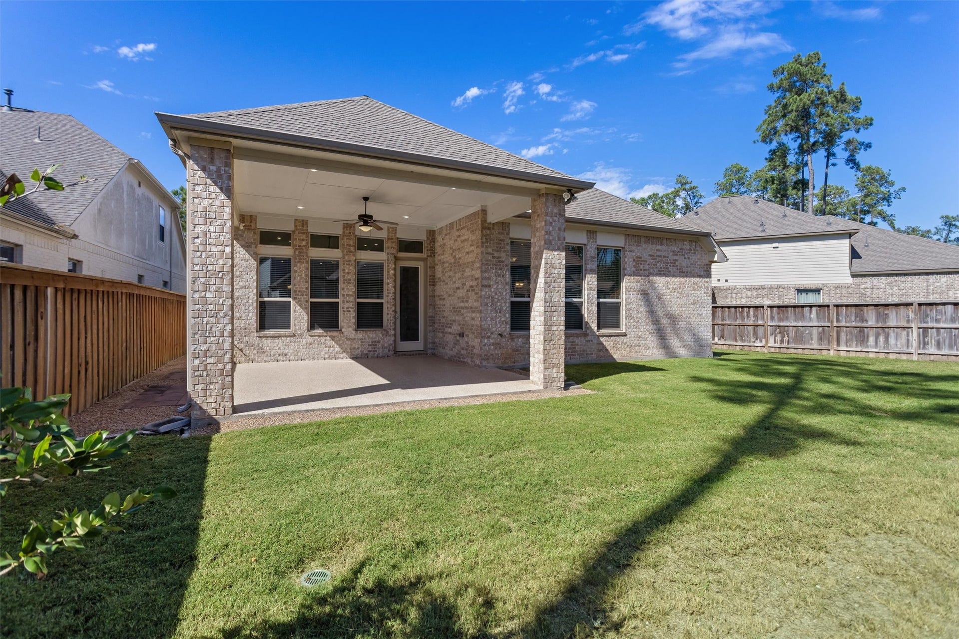 28205 Bennett Pass Drive, Spring, TX 77386 View of the back of the home. Brick all around for easy maintenance