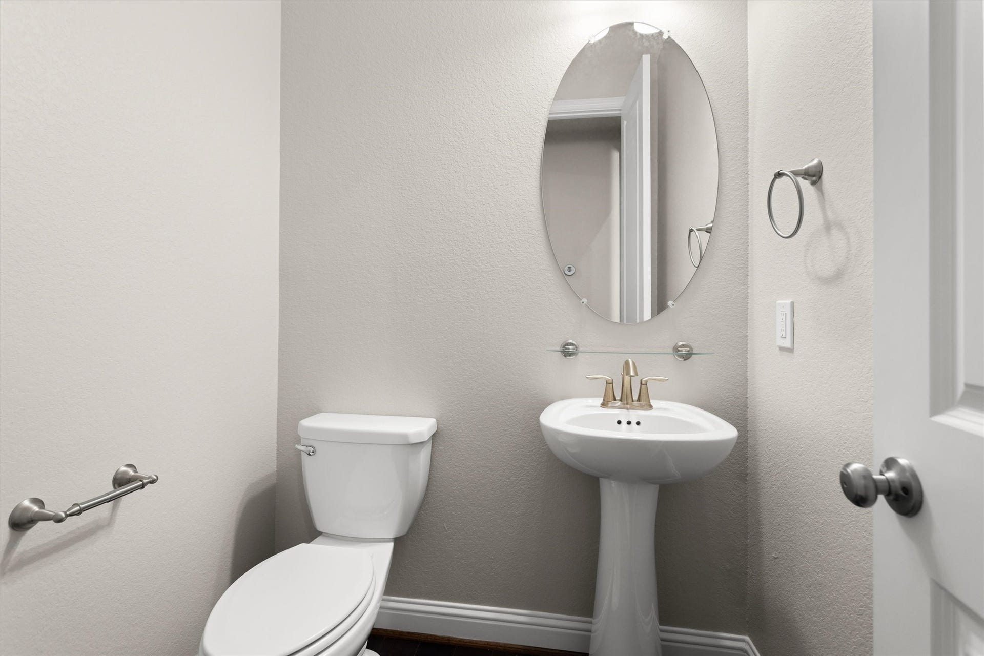 28205 Bennett Pass Drive, Spring, TX 77386 Guest powder room with modern fixtures