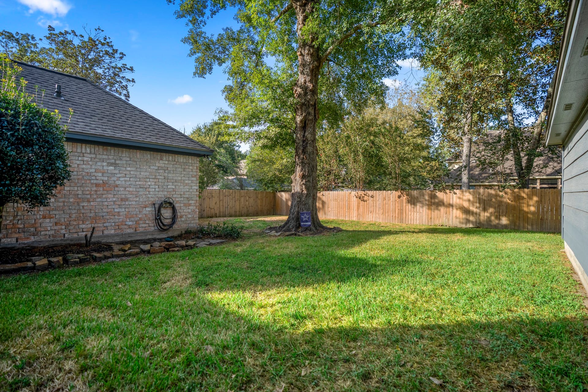 812 Woodland Lane, Conroe, TX 77302 Large backyard...ready for your swing set or hammock!