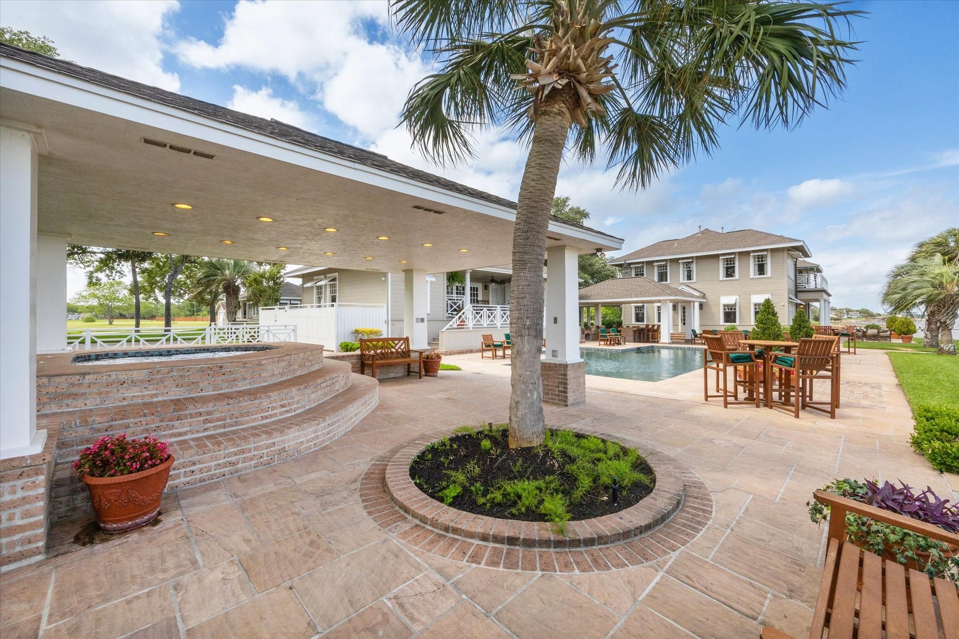 Plenty of space for dining, relaxing and entertaining  around the pool and hot tub.