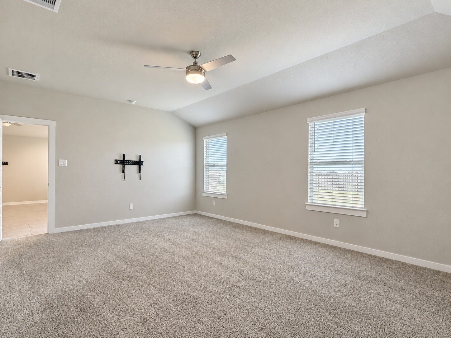 29443 Bryans Manor, Fulshear, TX 77494 Additional view of the primary bedroom showcasing its generous floor space, natural lighting, and comfortable layout.