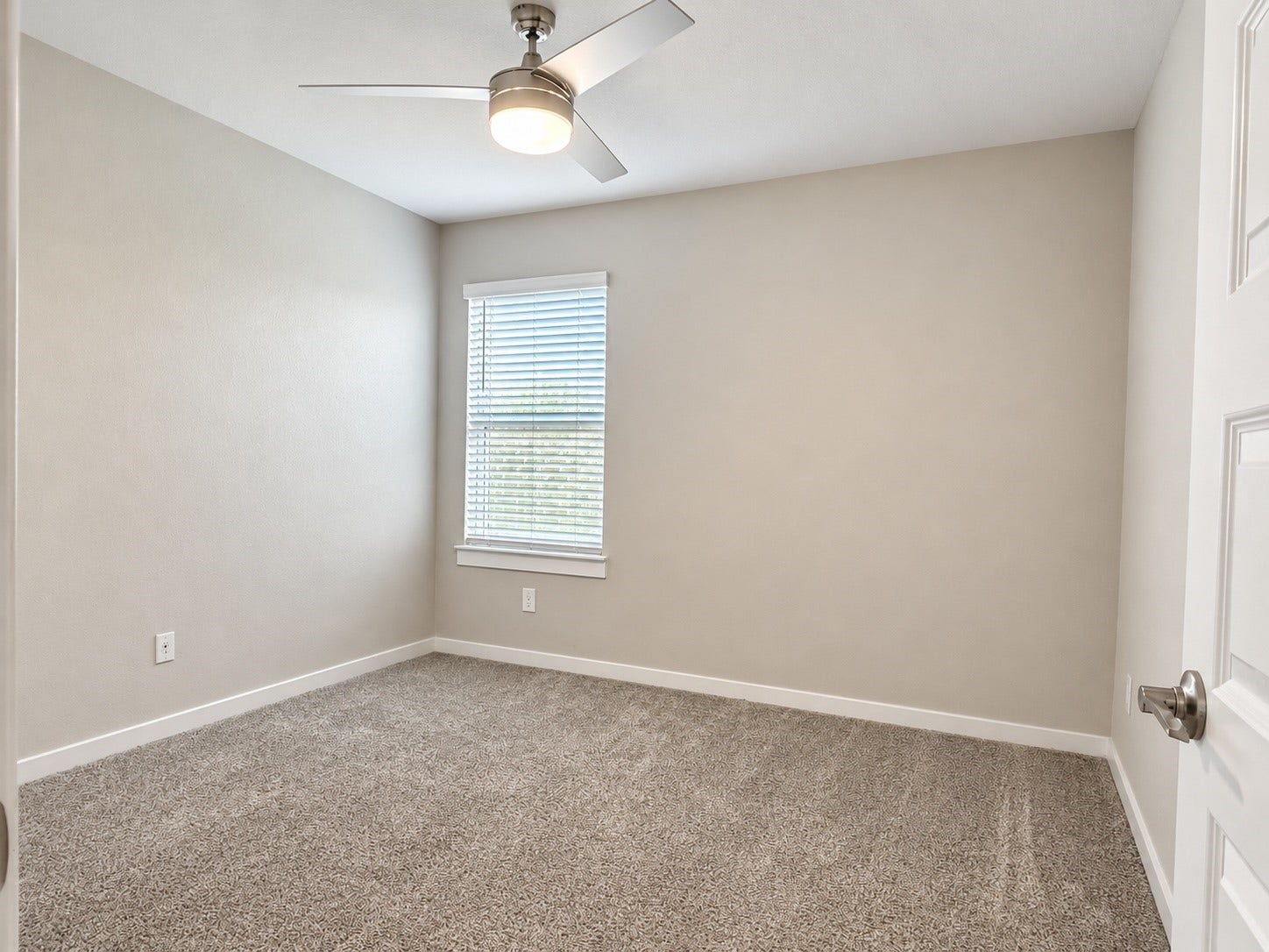 29443 Bryans Manor, Fulshear, TX 77494 Another secondary bedroom featuring plush carpeting, neutral wall colors, a ceiling fan with lighting, and natural light.