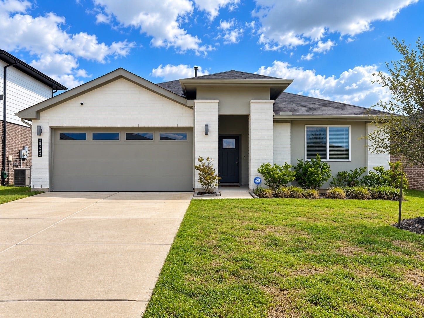 29443 Bryans Manor, Fulshear, TX 77494 Welcome home! Beautiful single-story home featuring a modern exterior, inviting curb appeal, manicured landscaping, and an attached two-car garage.