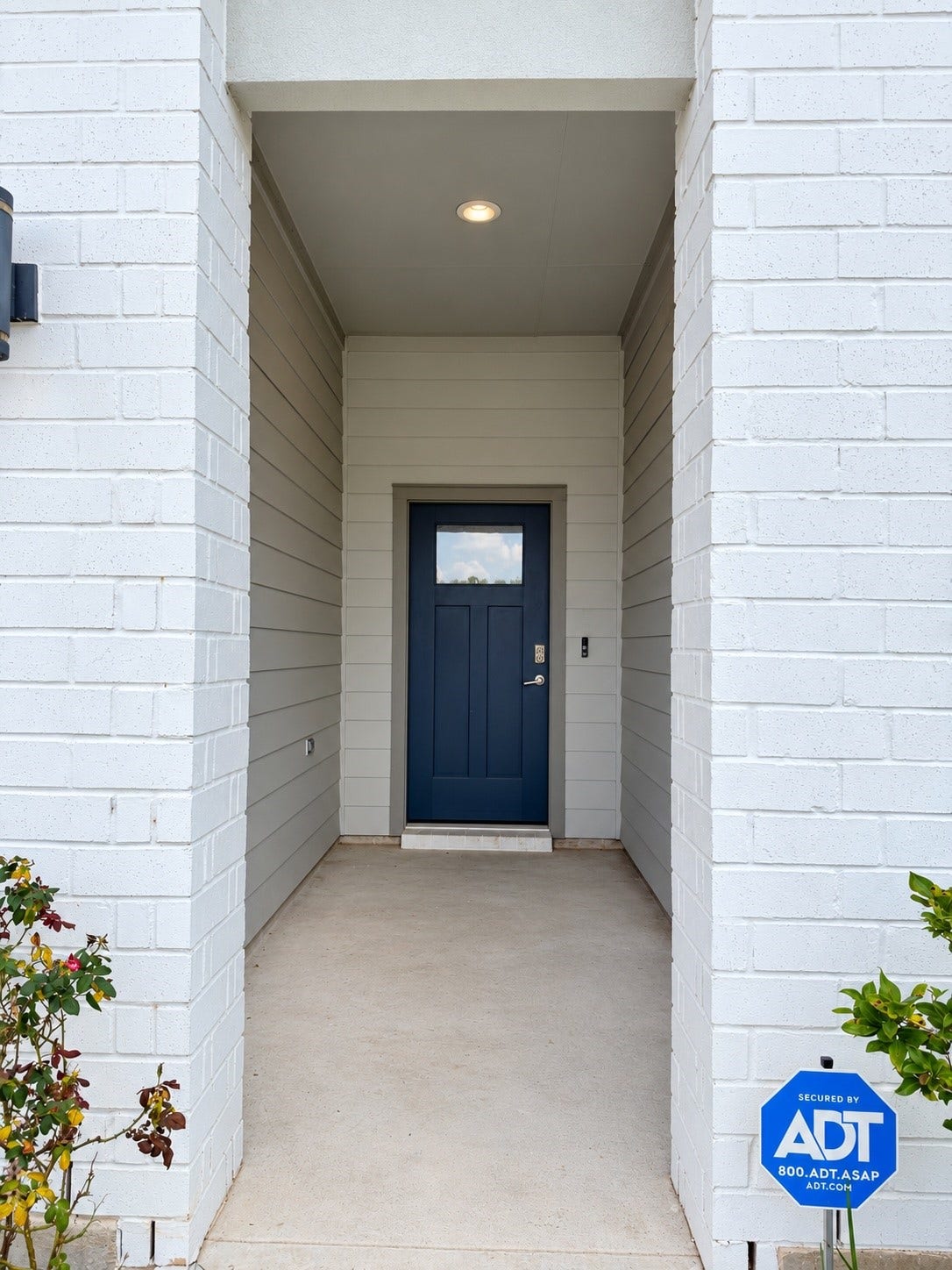 29443 Bryans Manor, Fulshear, TX 77494 Welcoming covered front entry featuring a recessed porch, modern front door, and convenient protection from the elements.