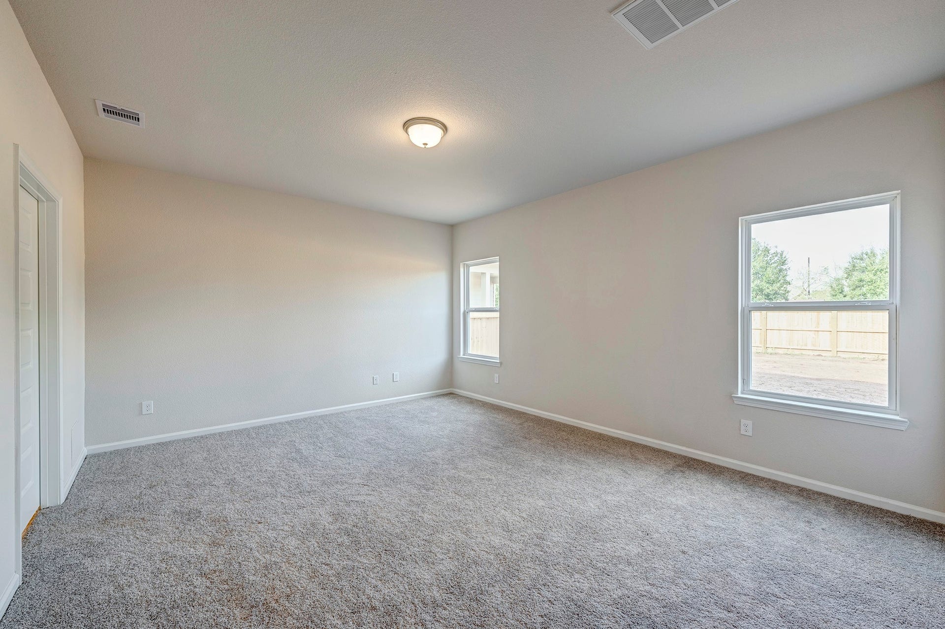 The Caldwell- Primary Bedroom. Home is under construction. Sample image for illustration; upgrades, options, and colors may vary.