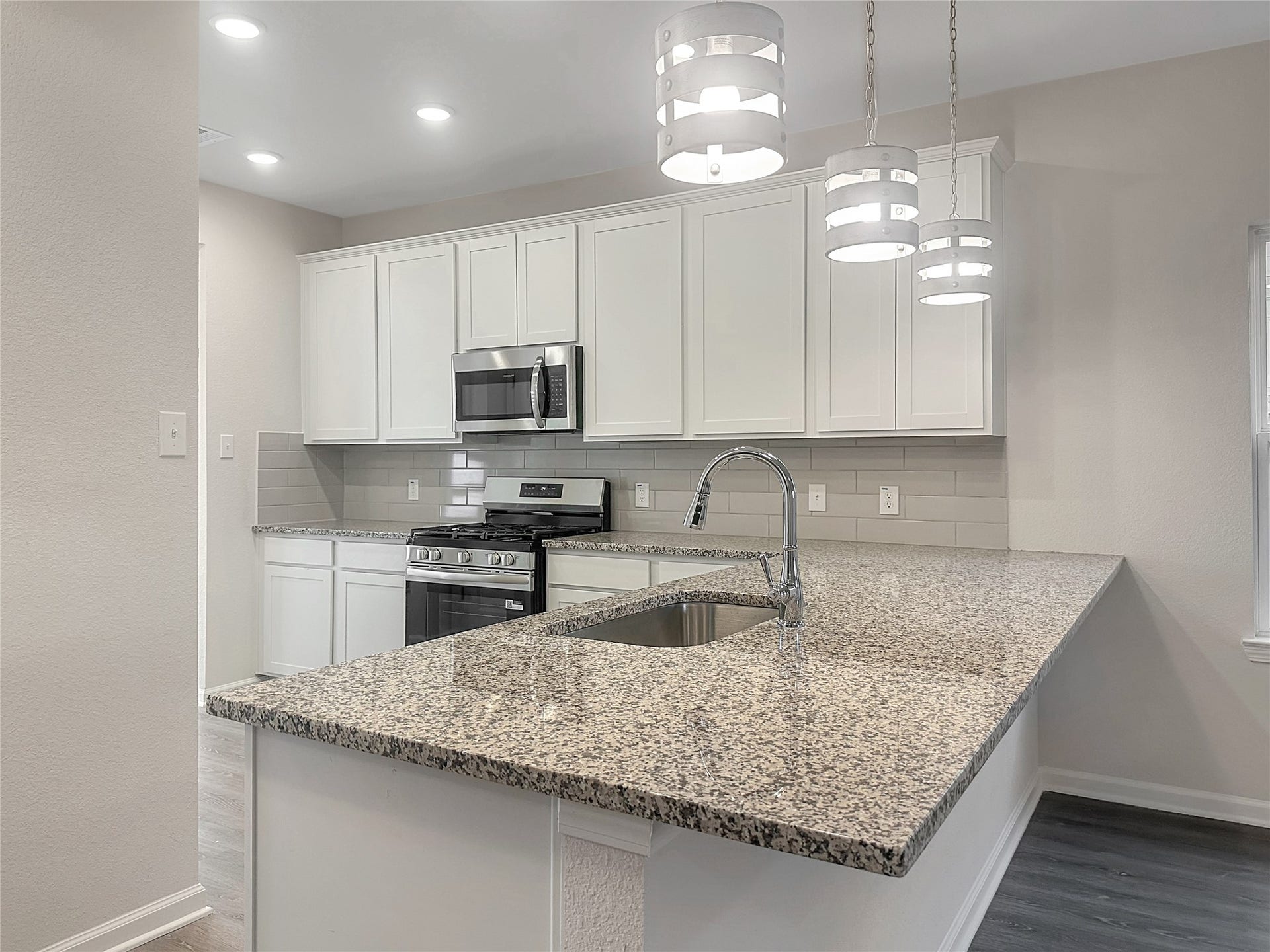The Caldwell-  Kitchen. Home is under construction. Sample image for illustration; upgrades, options, and colors may vary.