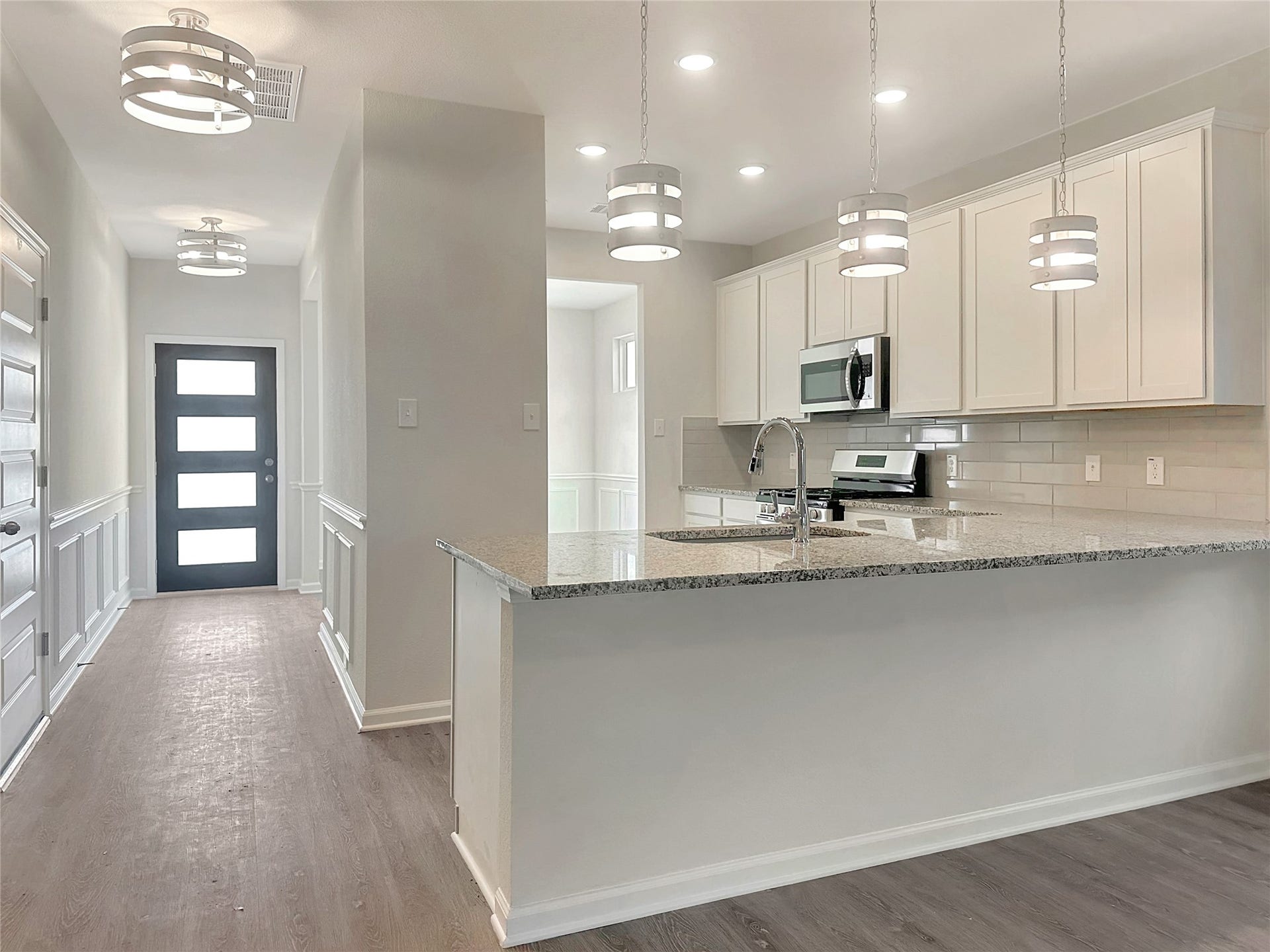 The Caldwell- Kitchen. Home is under construction. Sample image for illustration; upgrades, options, and colors may vary.