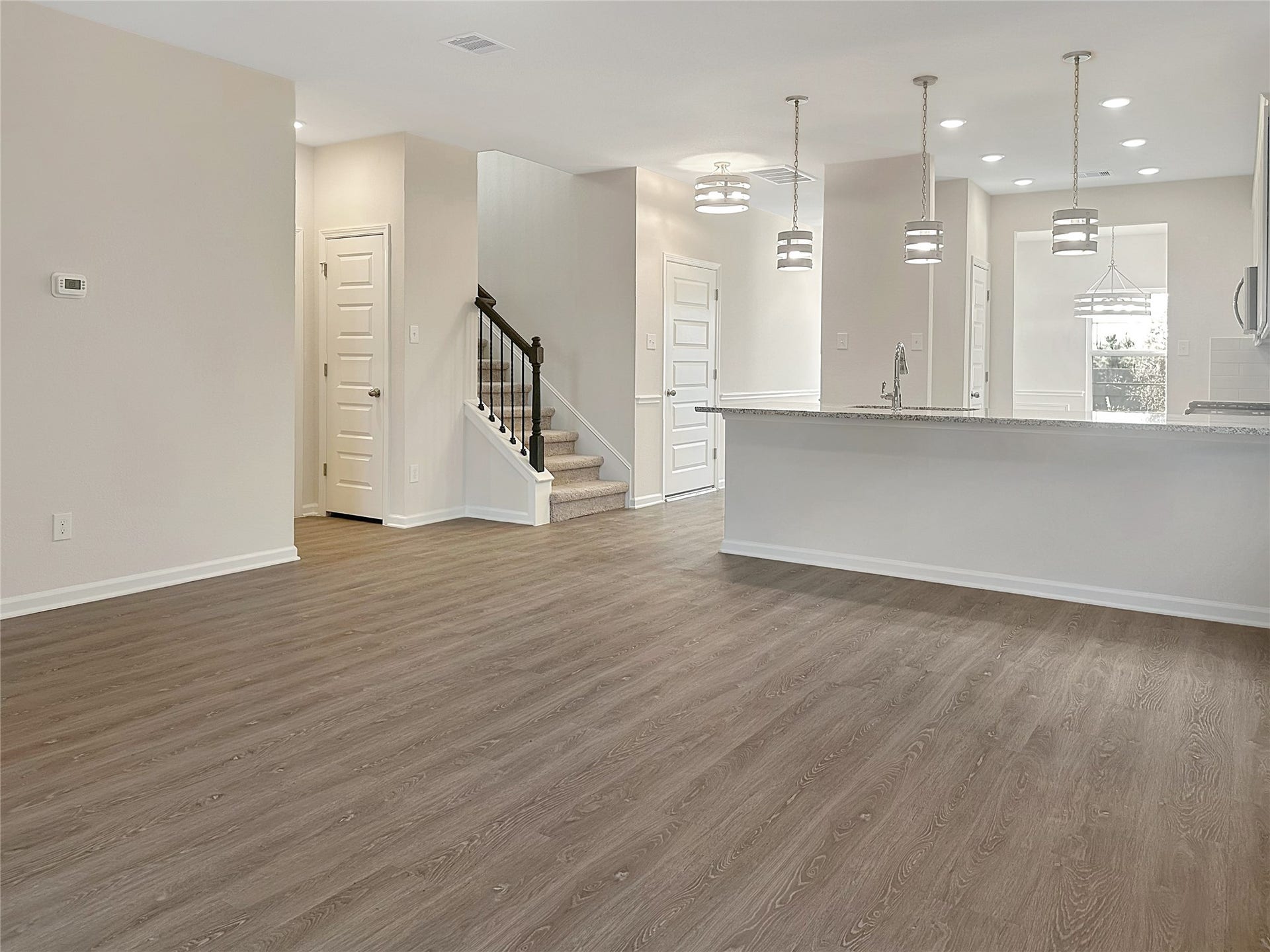 The Caldwell- Family Room. Home is under construction. Sample image for illustration; upgrades, options, and colors may vary.